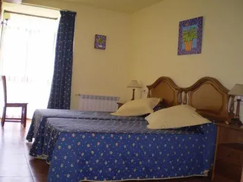 Photo of the whole room, Bed in Casa de Aldea Ruiloba Photo of the whole room, Bed in Casa de Aldea Ruiloba