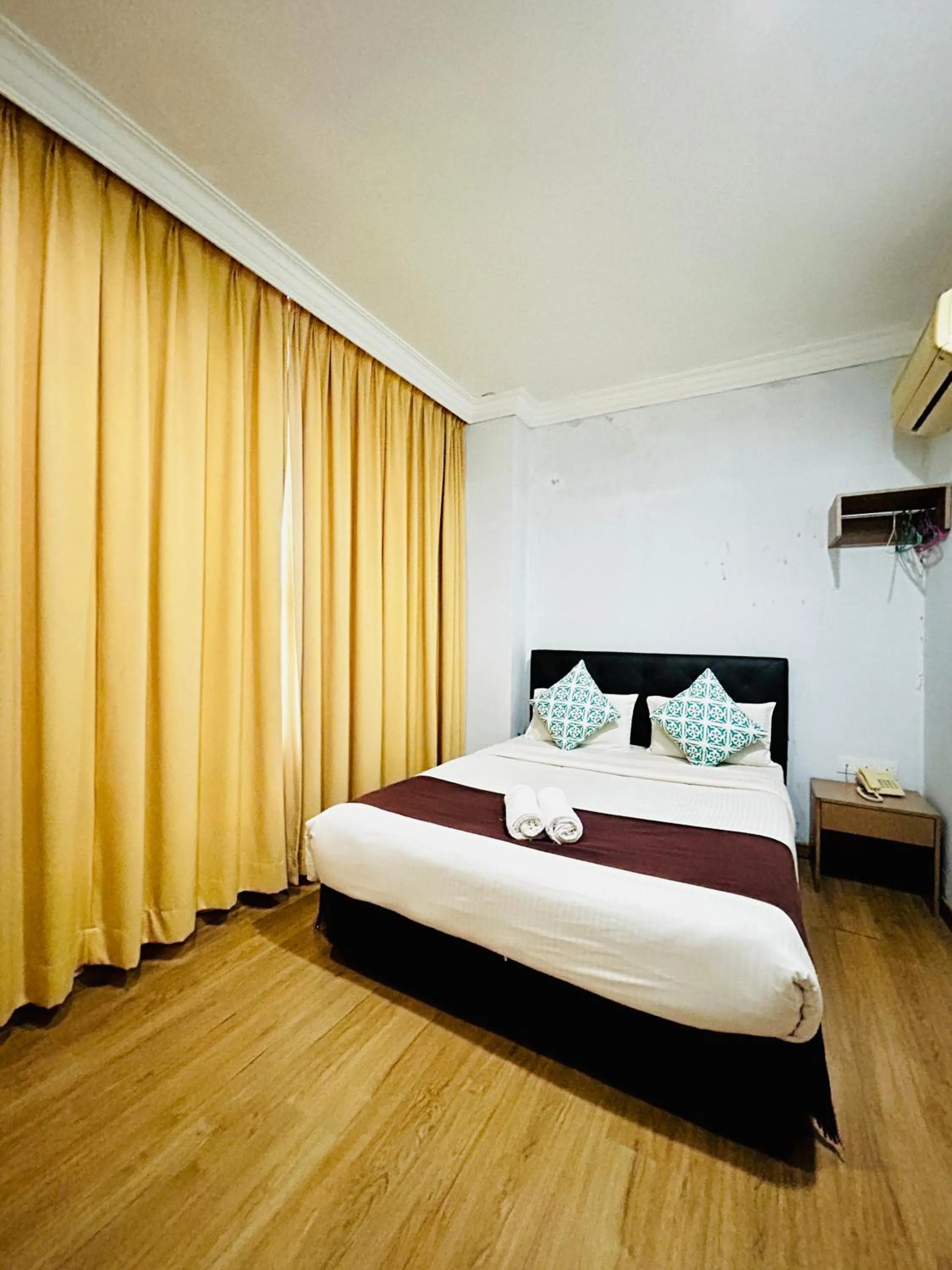 Bed in CHARISMA HOTEL