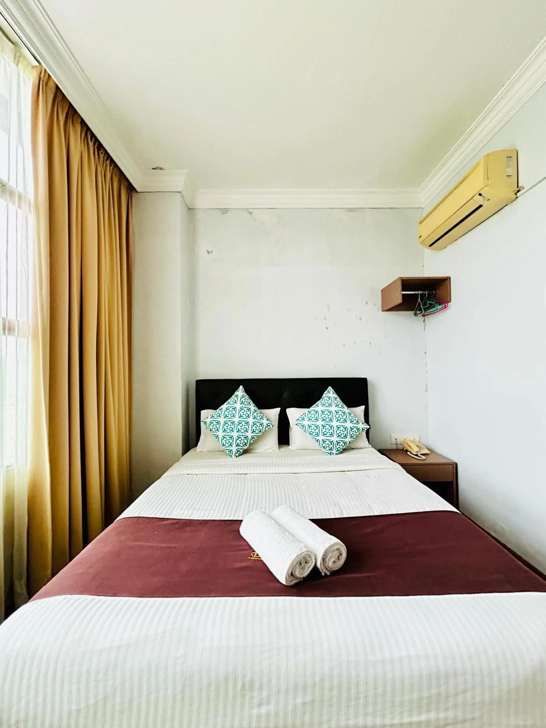 Bed in CHARISMA HOTEL