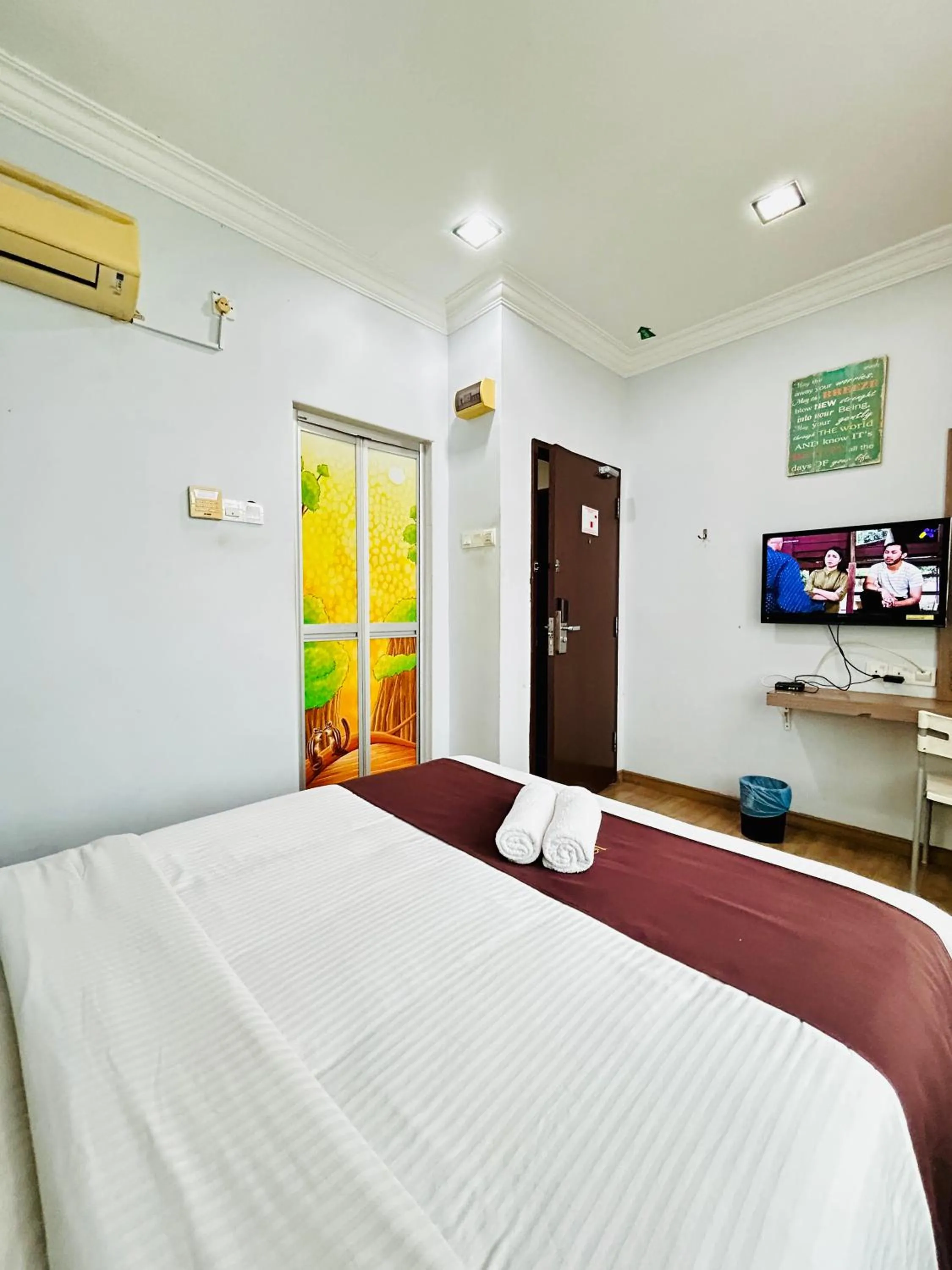 Bed in CHARISMA HOTEL