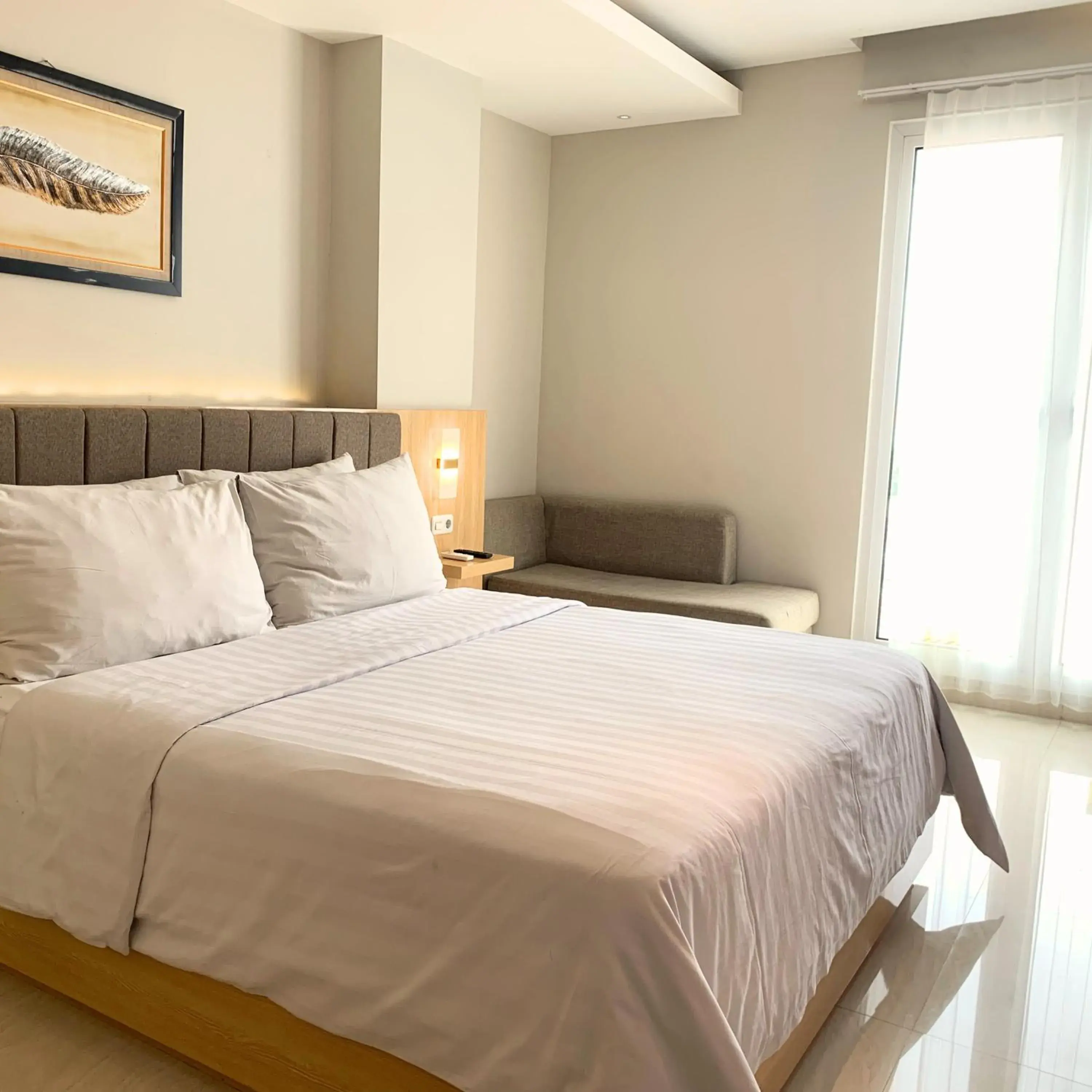 Deluxe King Room in Surabaya River View Hotel Deluxe King Room in Surabaya River View Hotel