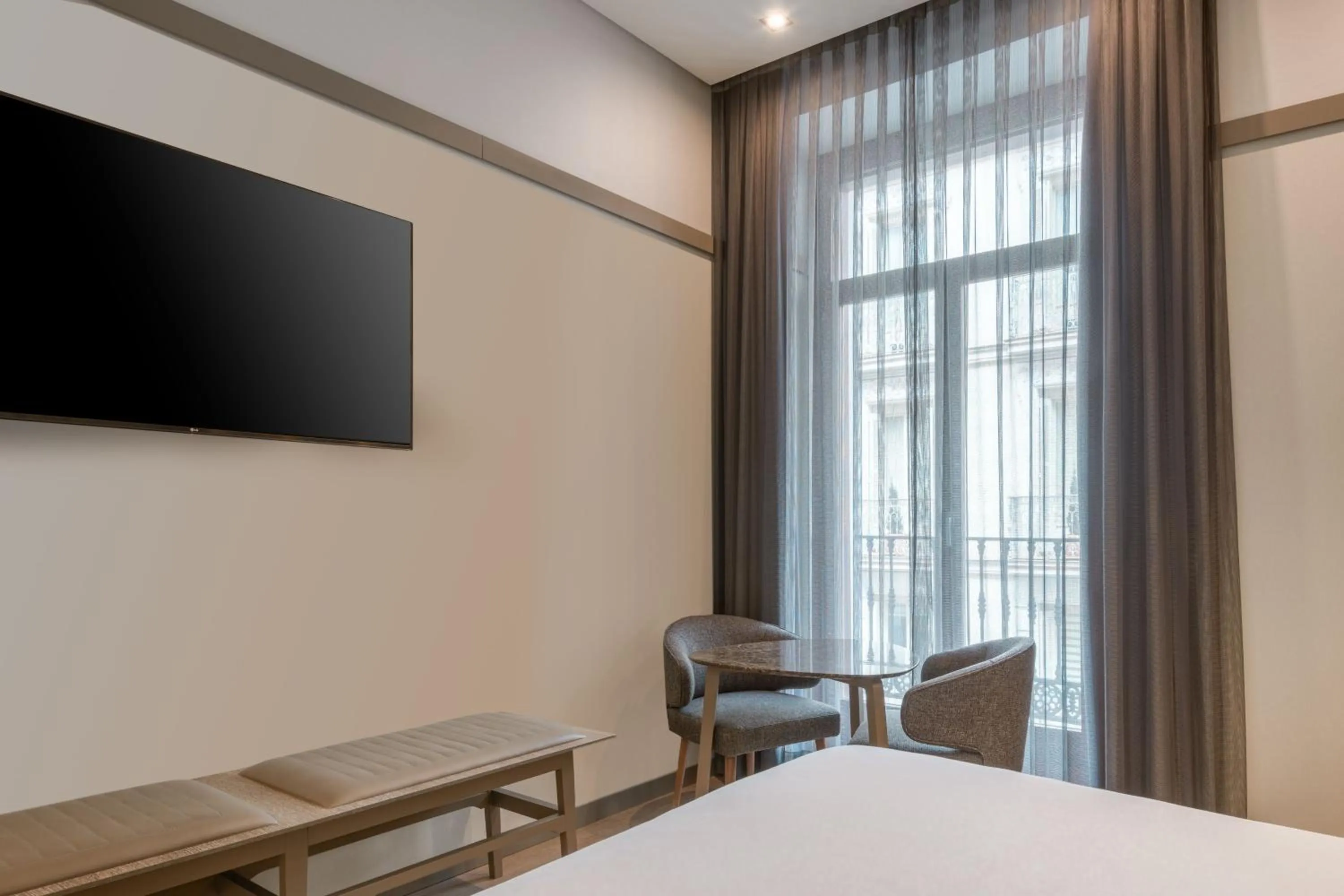 Photo of the whole room, Bed in AC Hotel Recoletos by Marriott