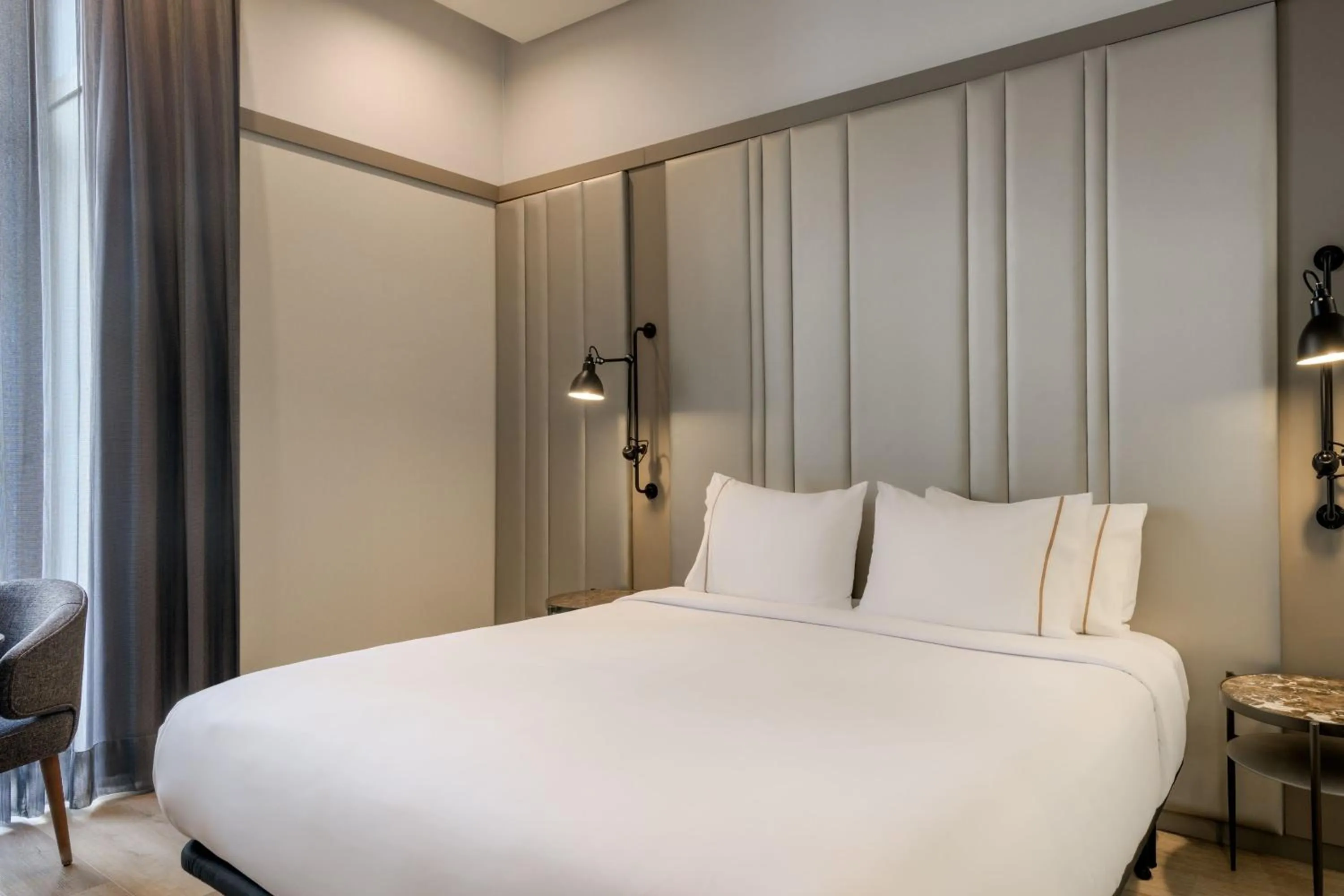 Photo of the whole room, Bed in AC Hotel Recoletos by Marriott