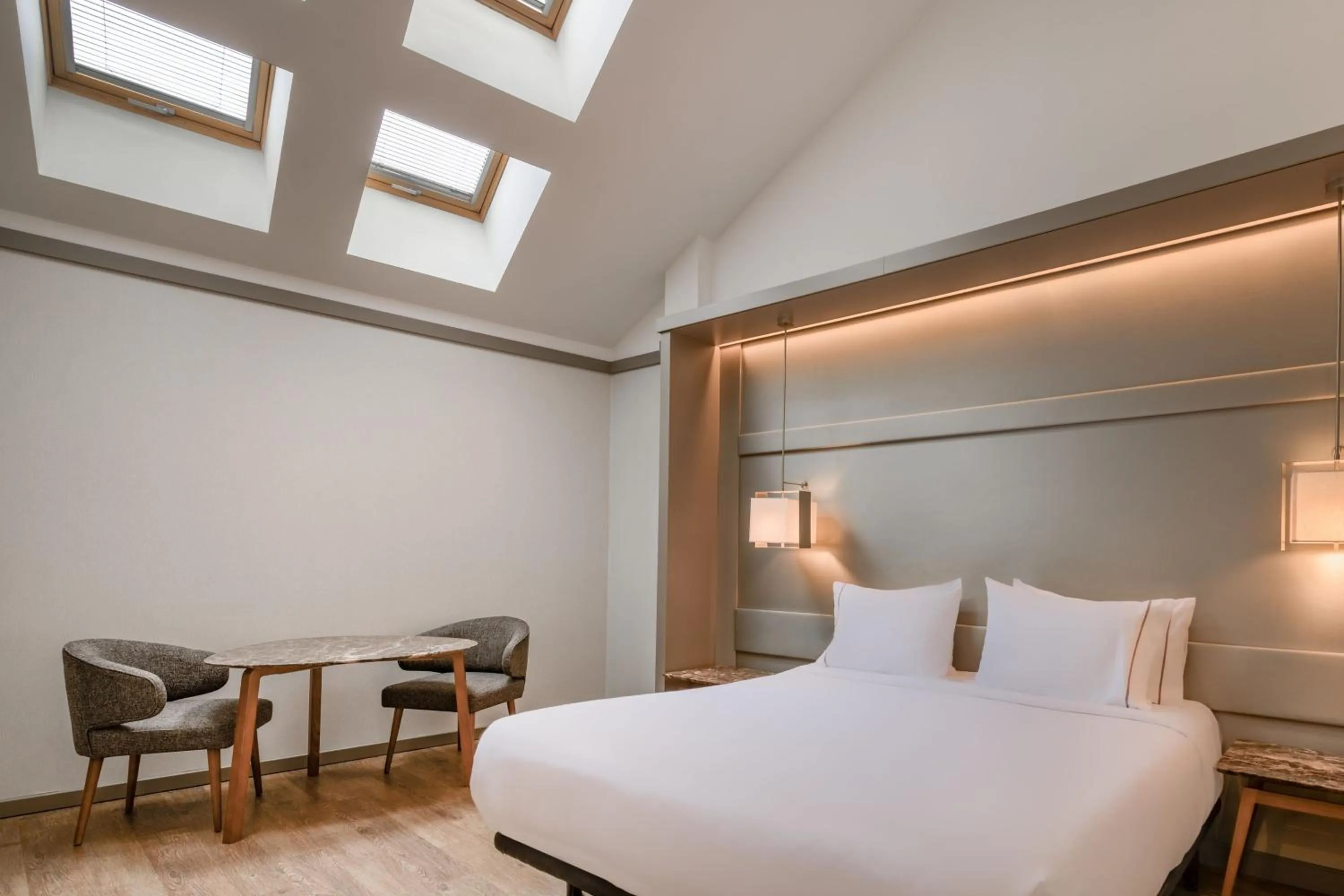 Photo of the whole room, Bed in AC Hotel Recoletos by Marriott