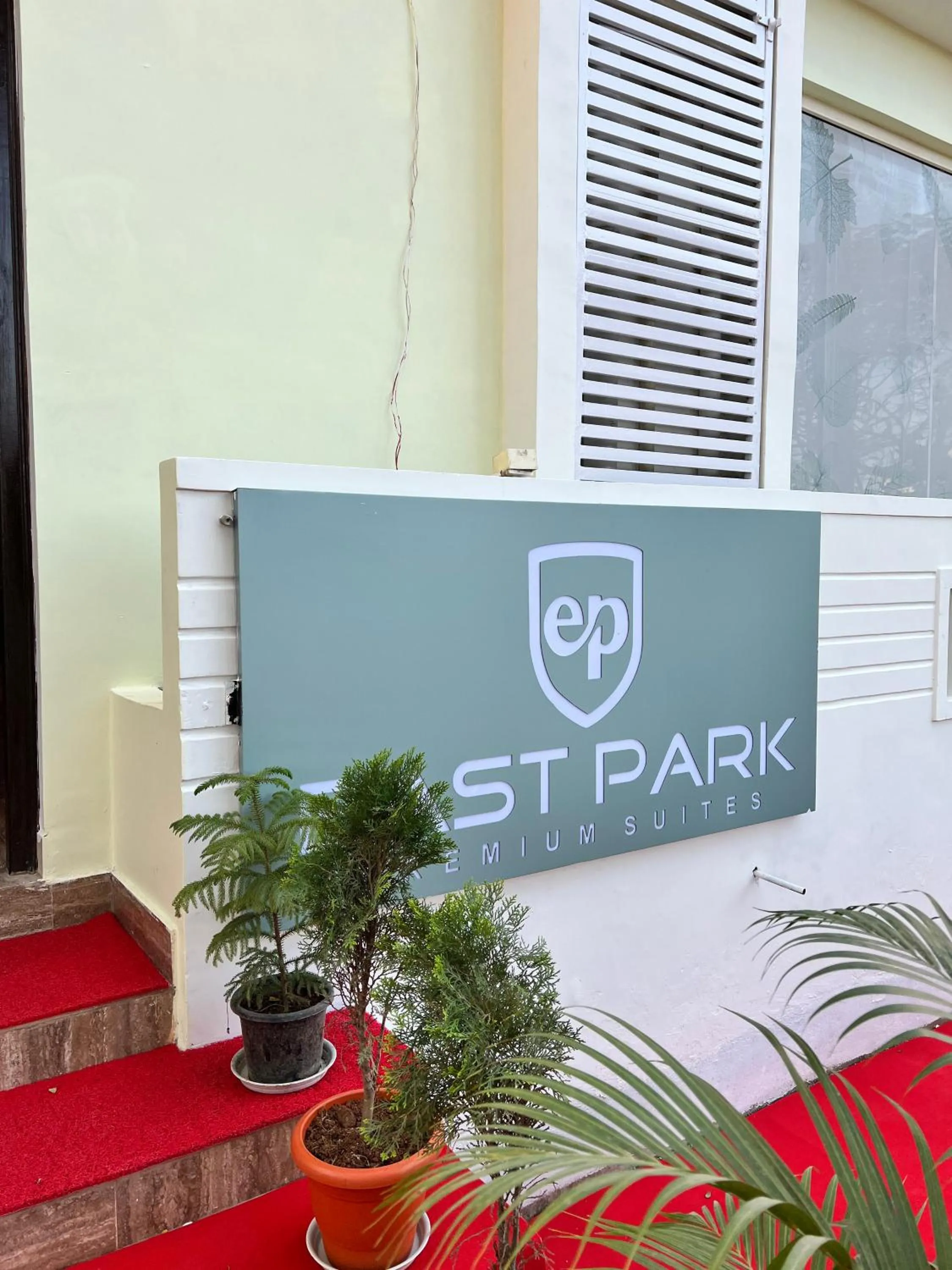 Property logo or sign in Hotel East park Electronic City