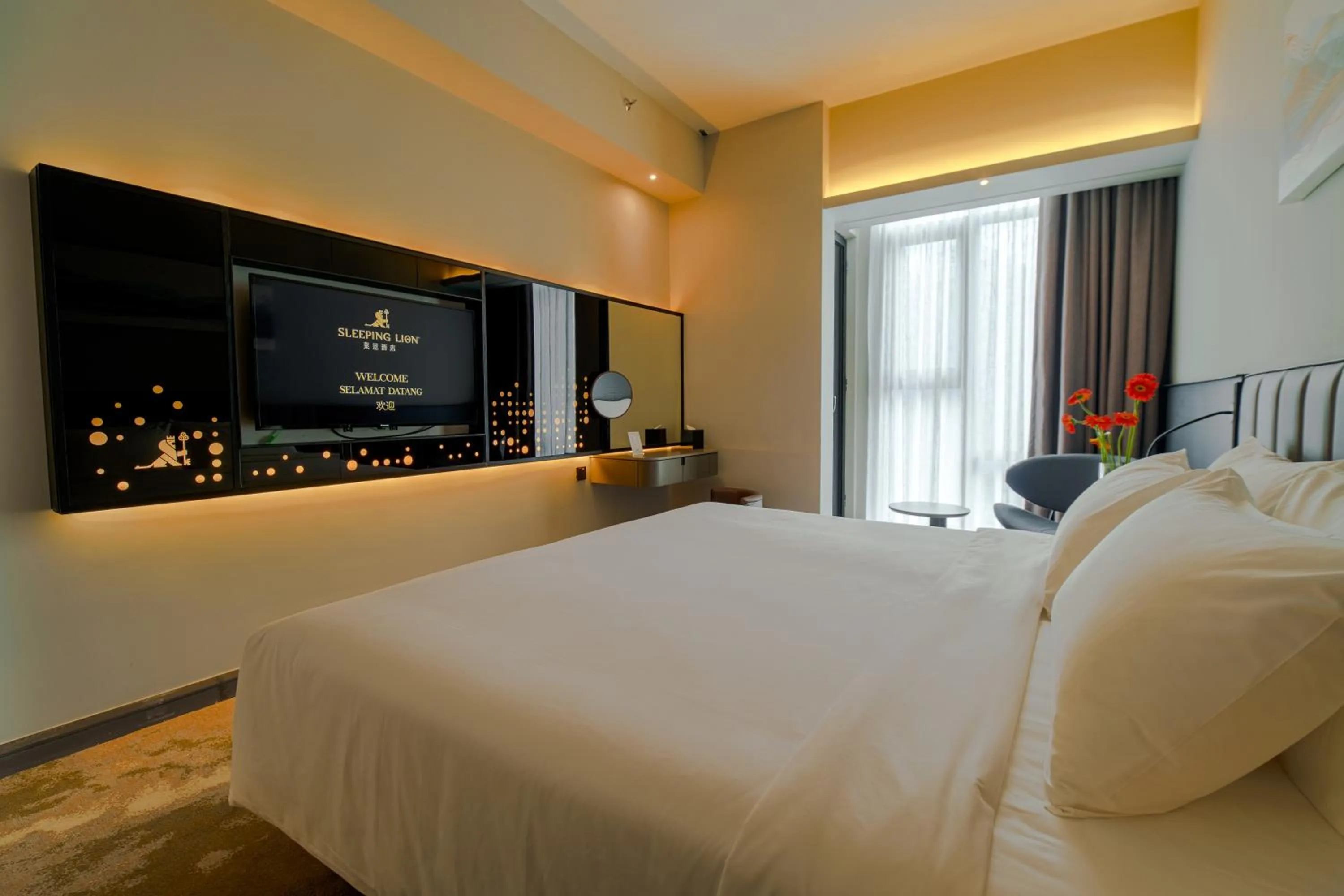 Bed in Sleeping Lion Suites