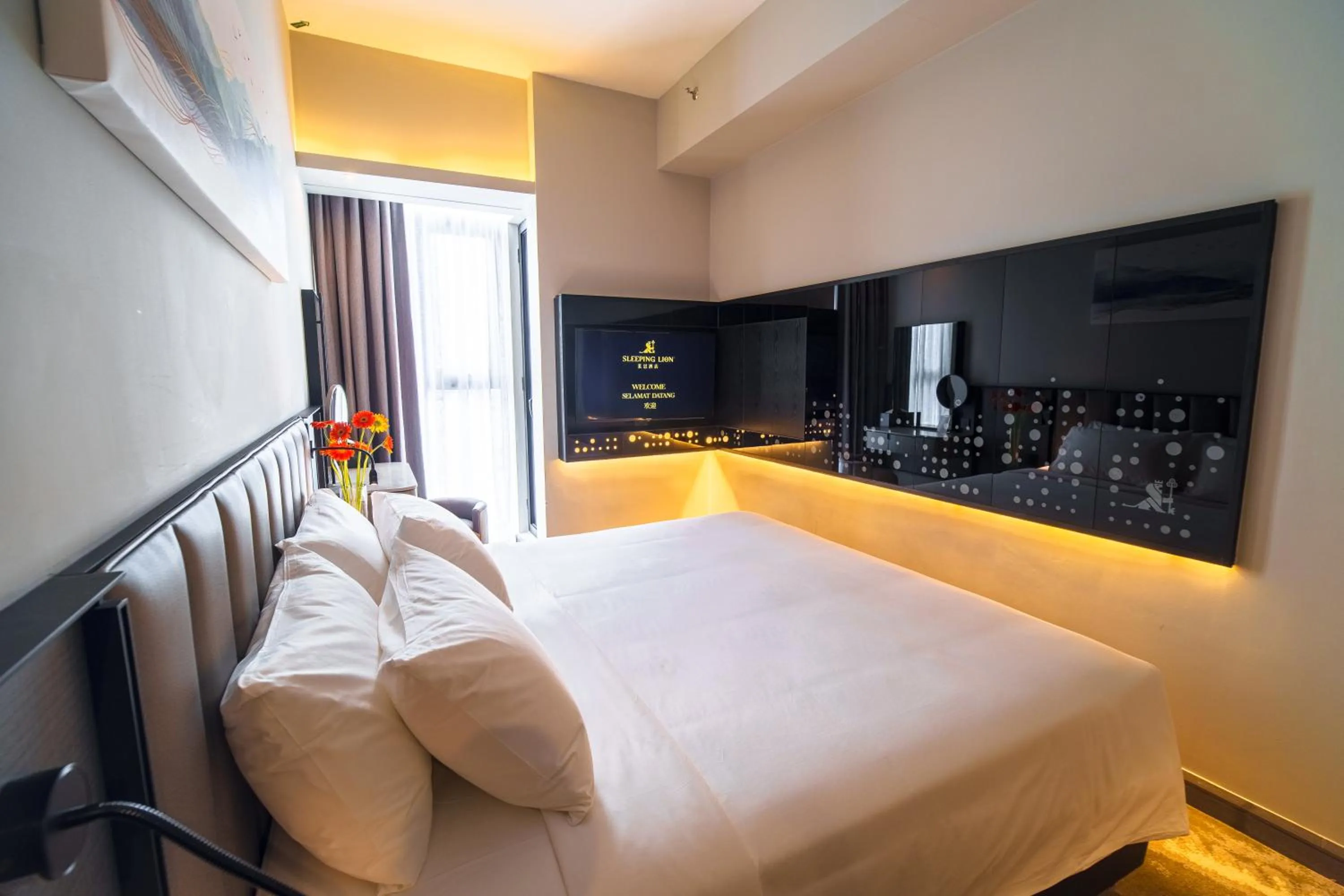 Bed in Sleeping Lion Suites