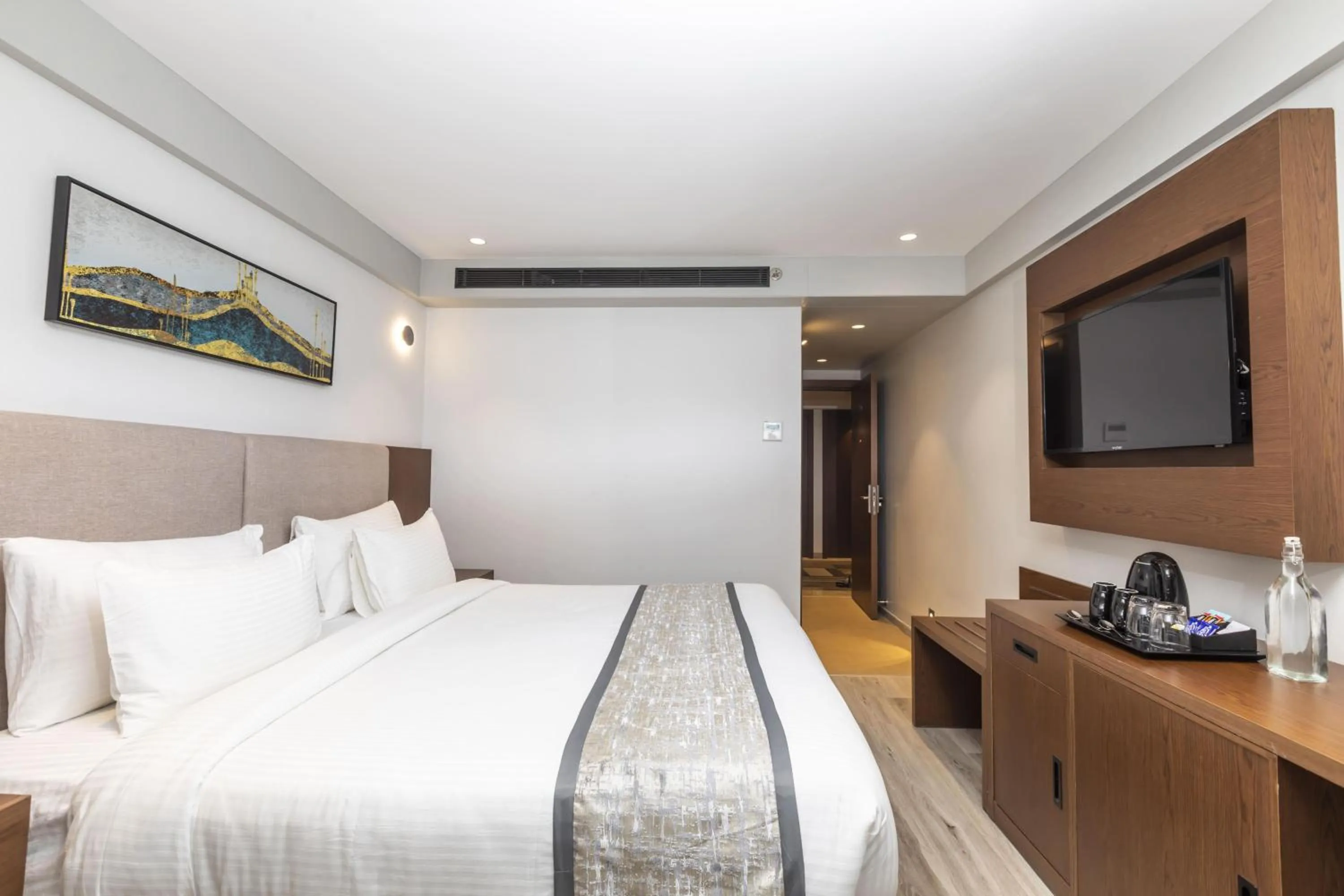 Bed in Ramee International Surat