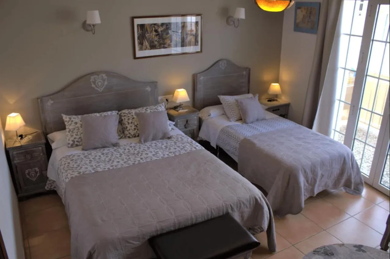 Triple Room with Private Bathroom in Hostal Don Peque