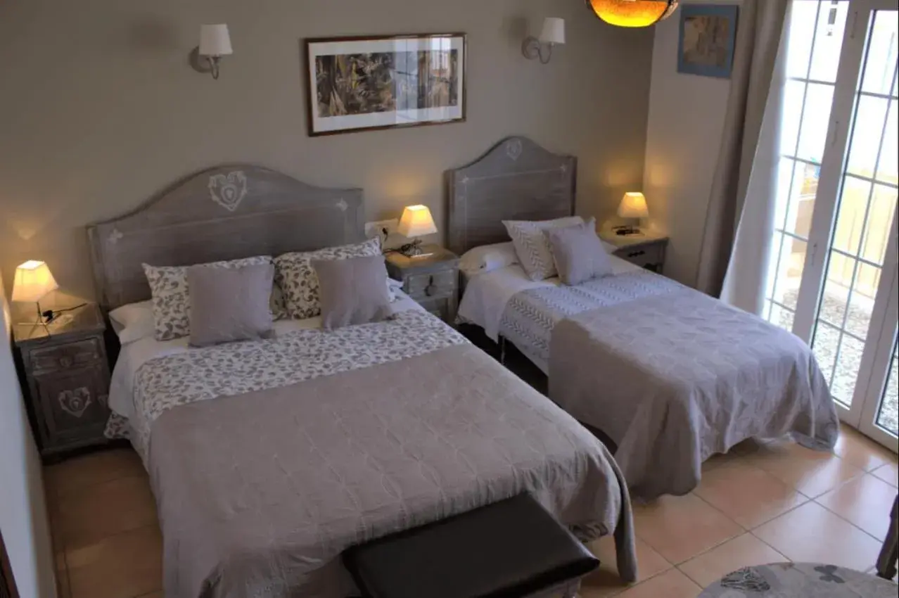 Triple Room with Private Bathroom in Hostal Don Peque Triple Room with Private Bathroom in Hostal Don Peque