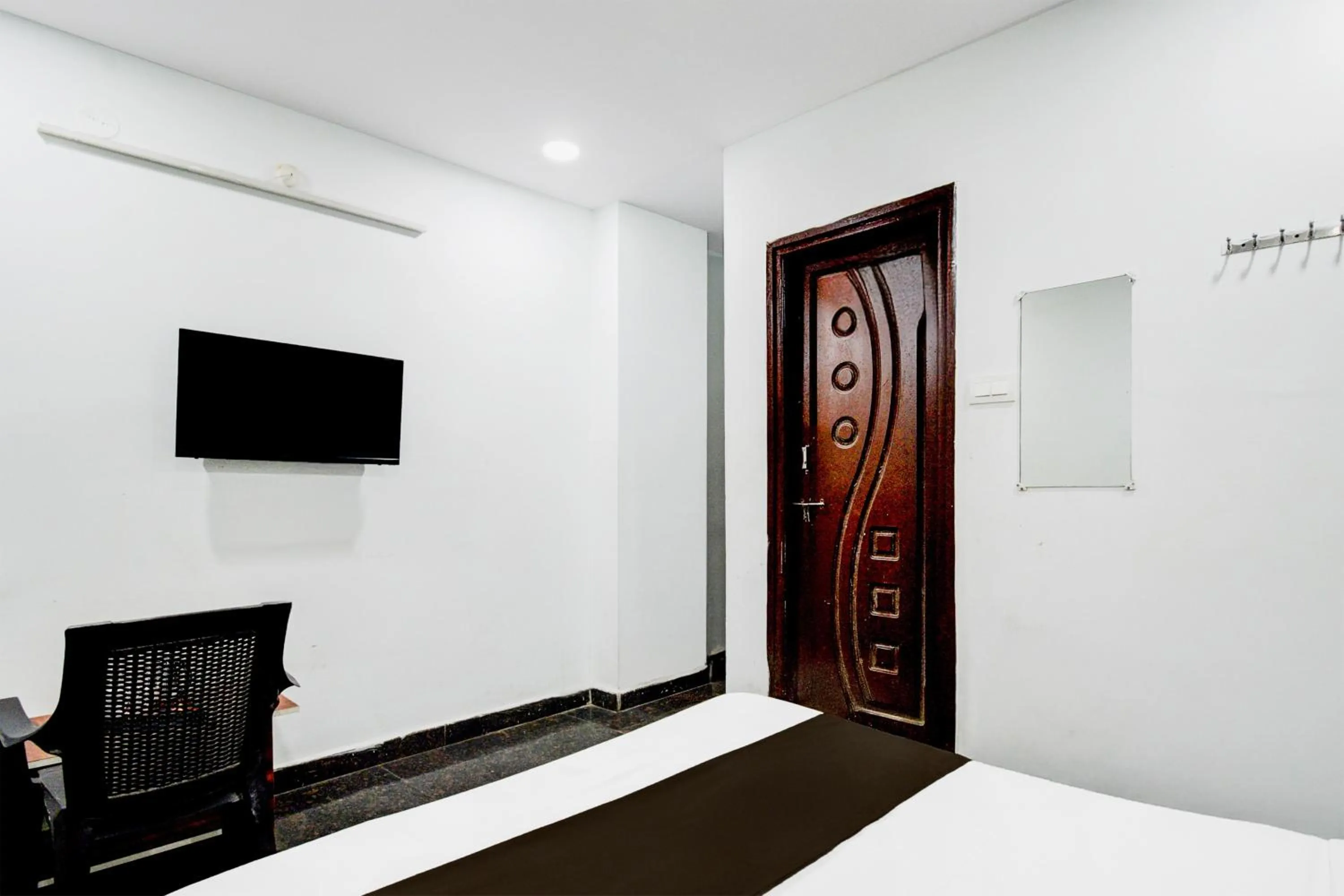 Bedroom in Super Hotel O Malkajgiri