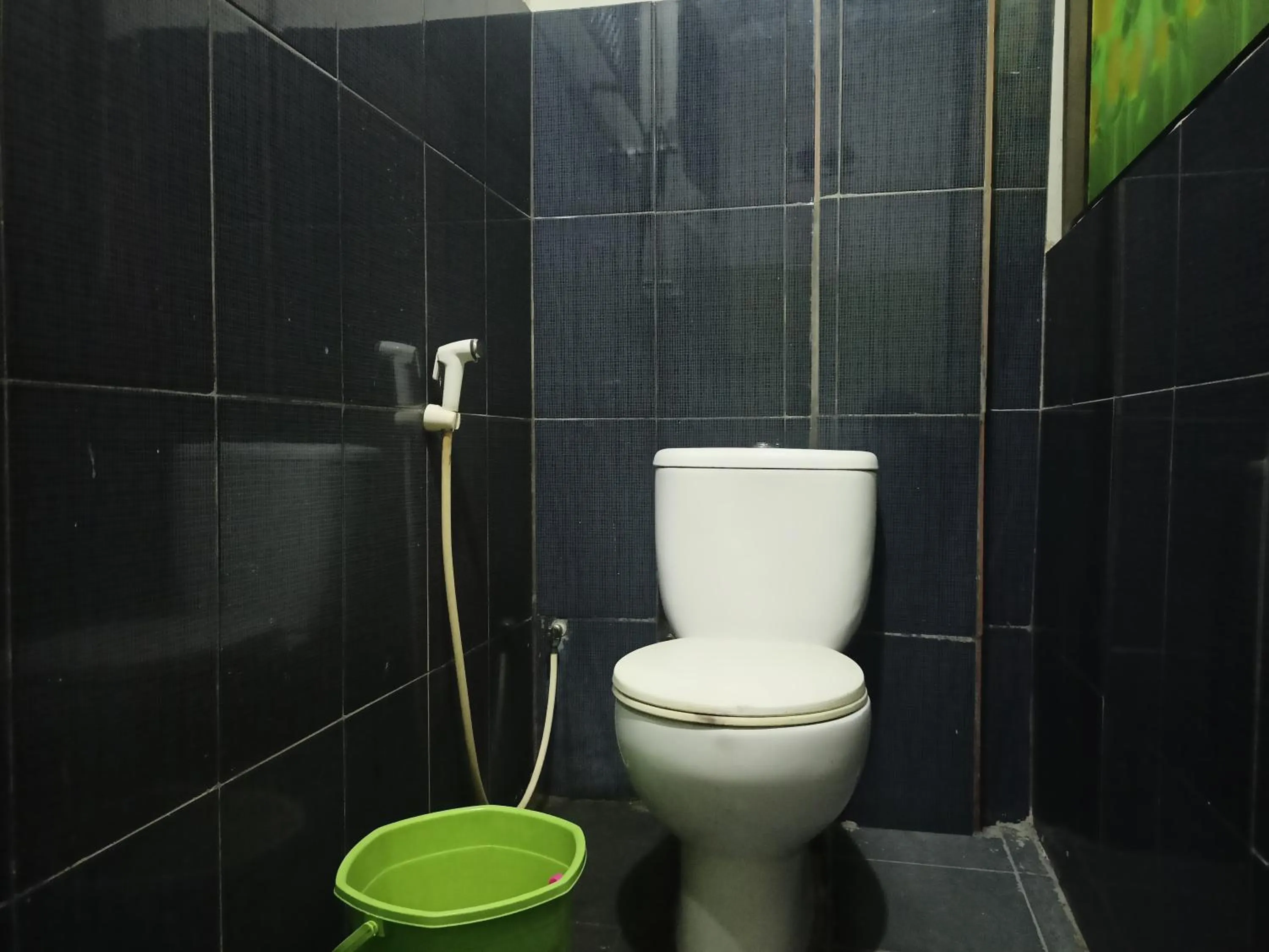 Bathroom in Hotel O Syariah Sumber Mulya NunukanNearAlun - Alun Kota Nunukan