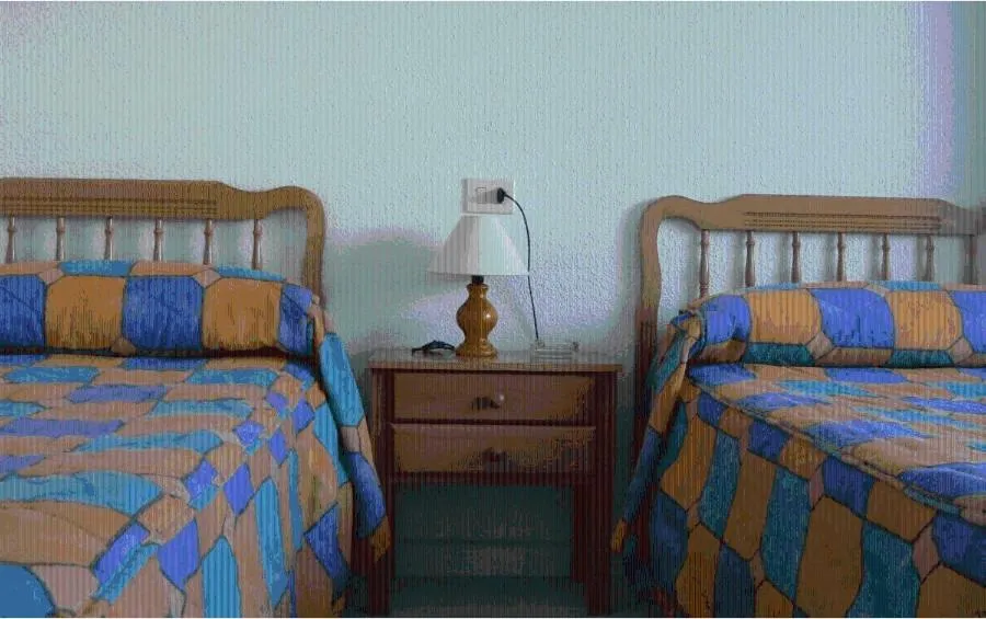 Photo of the whole room, Bed in La Obrera