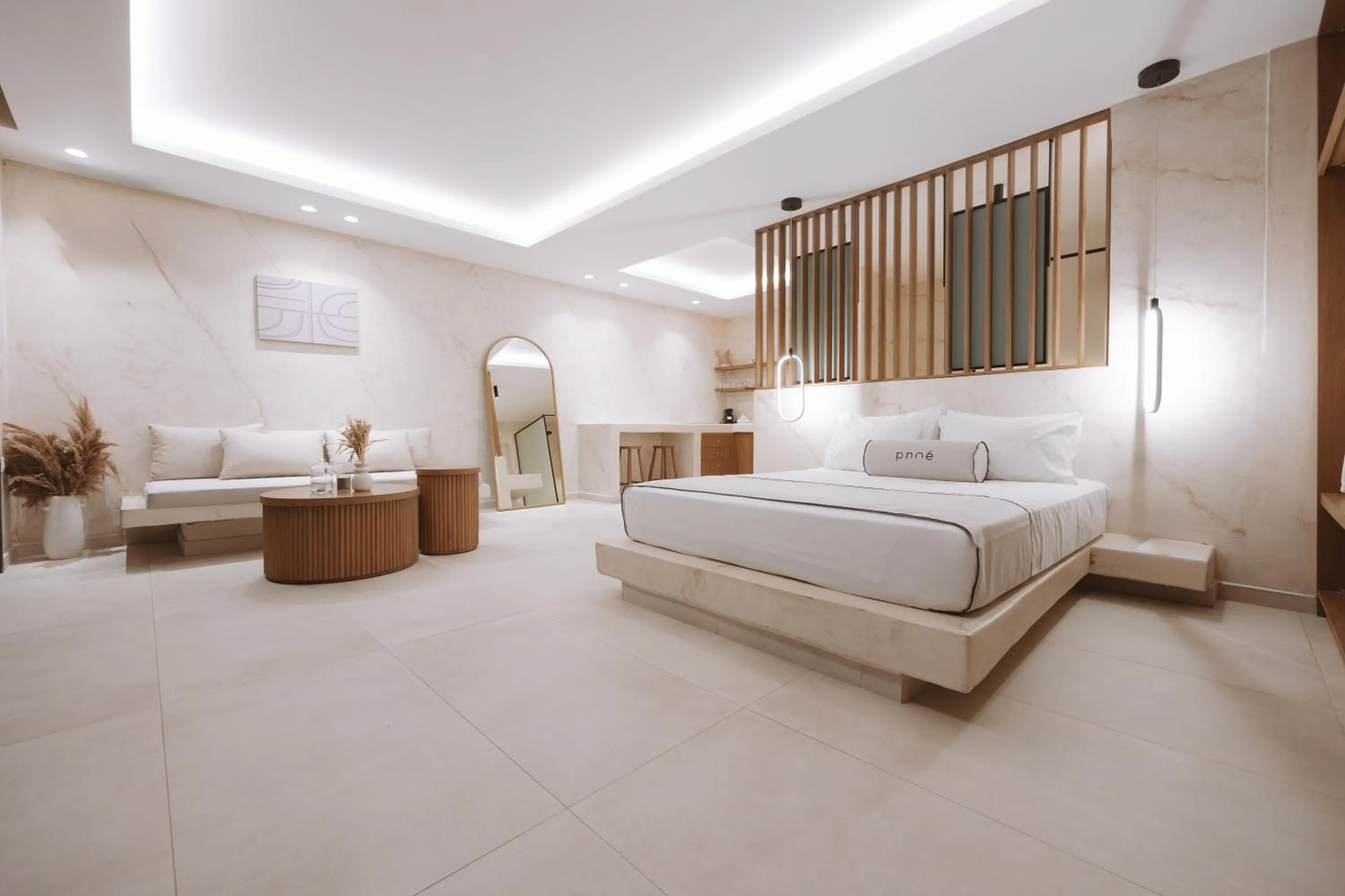 Bed in Pnoe Luxury Suites