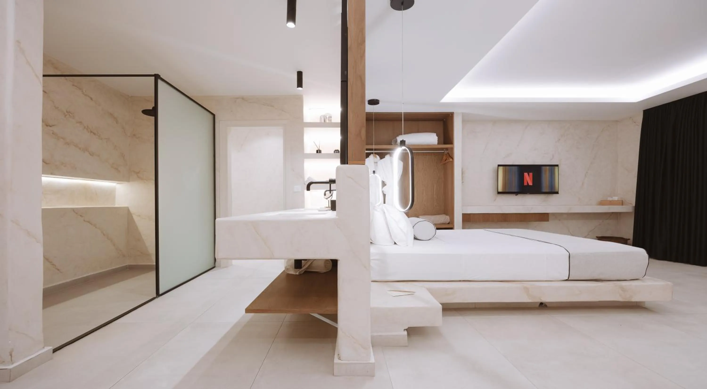 Shower, Bed in Pnoe Luxury Suites