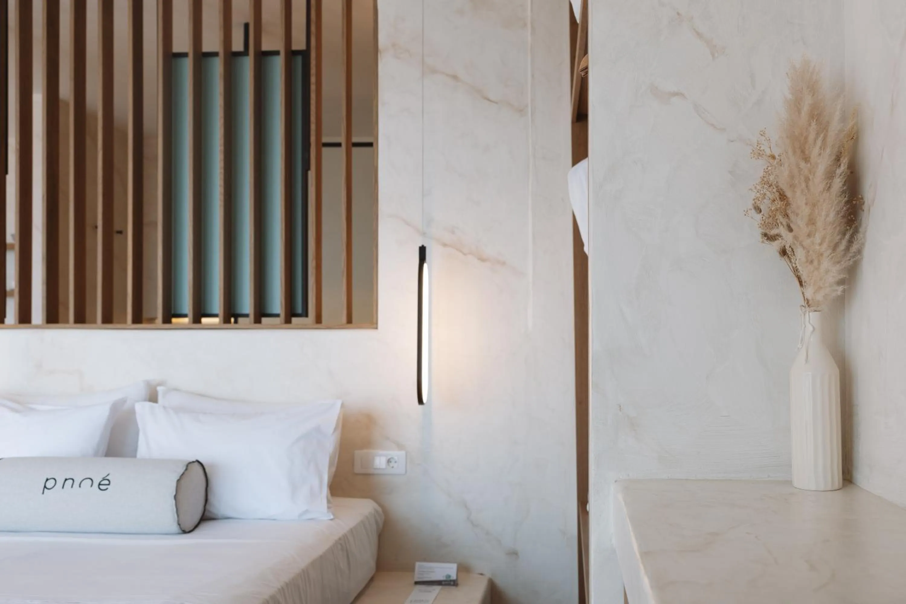 Bed in Pnoe Luxury Suites