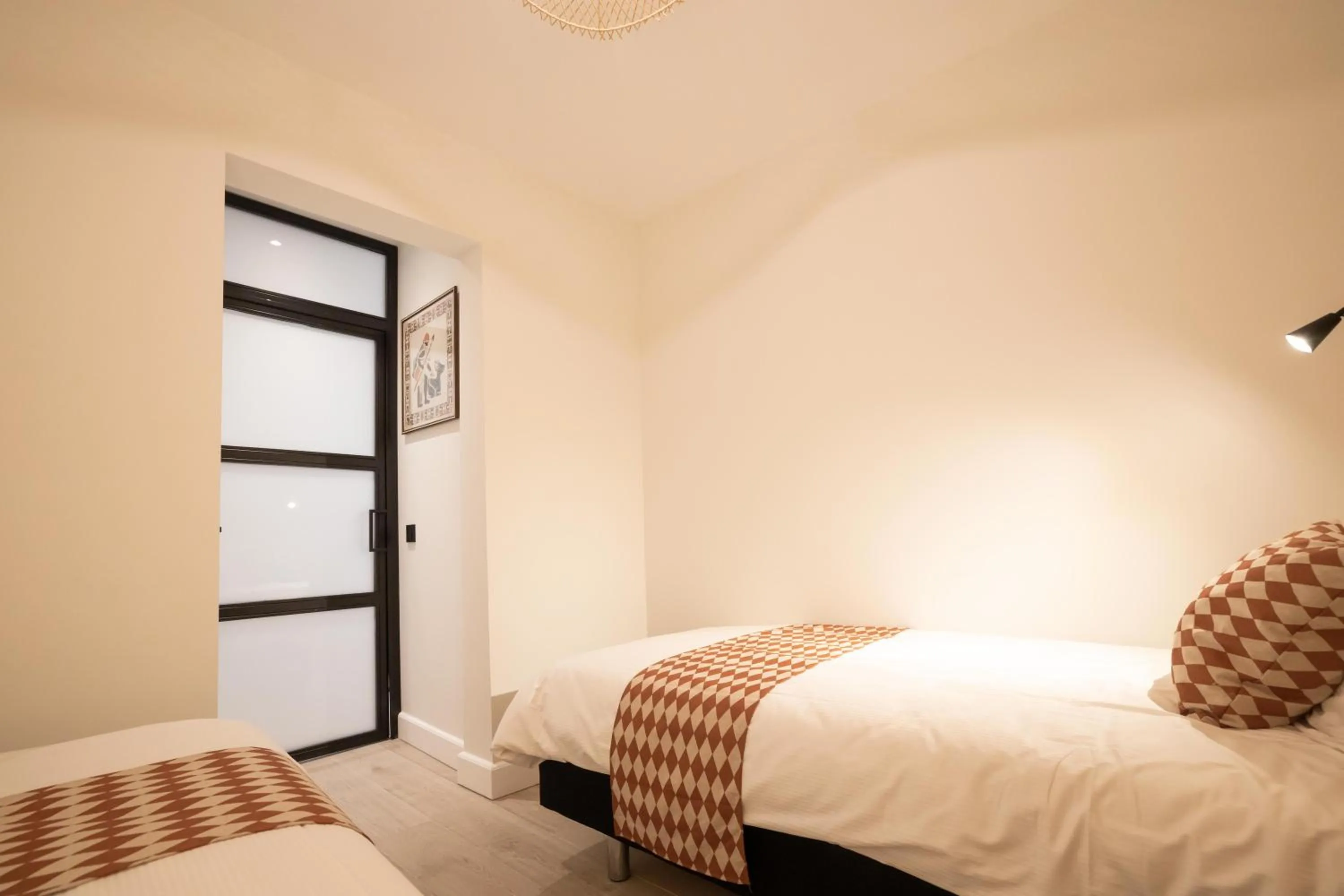 Bed in Modern two bedroom apartment close to the beach