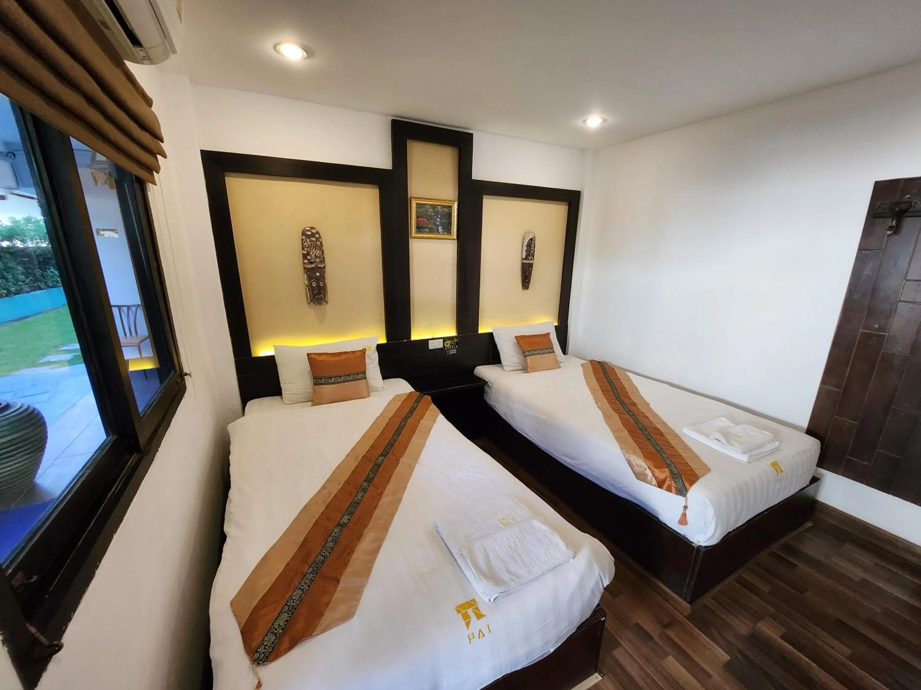 Bed in Pai Residence Hotel