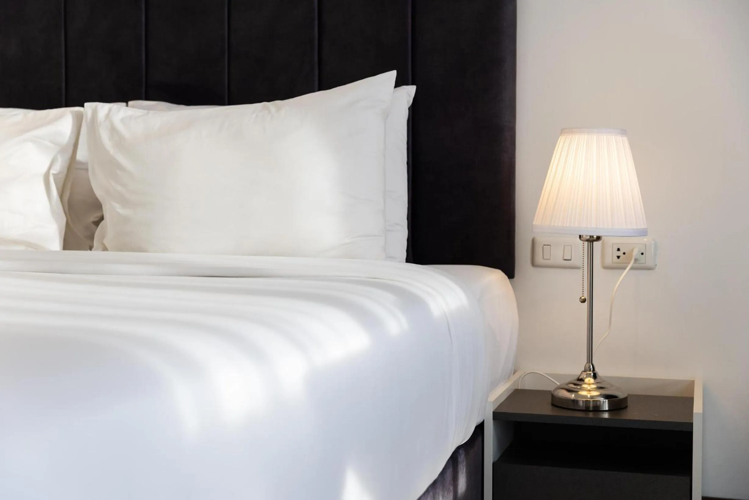 Bed in AMIRI PLACE HOTEL