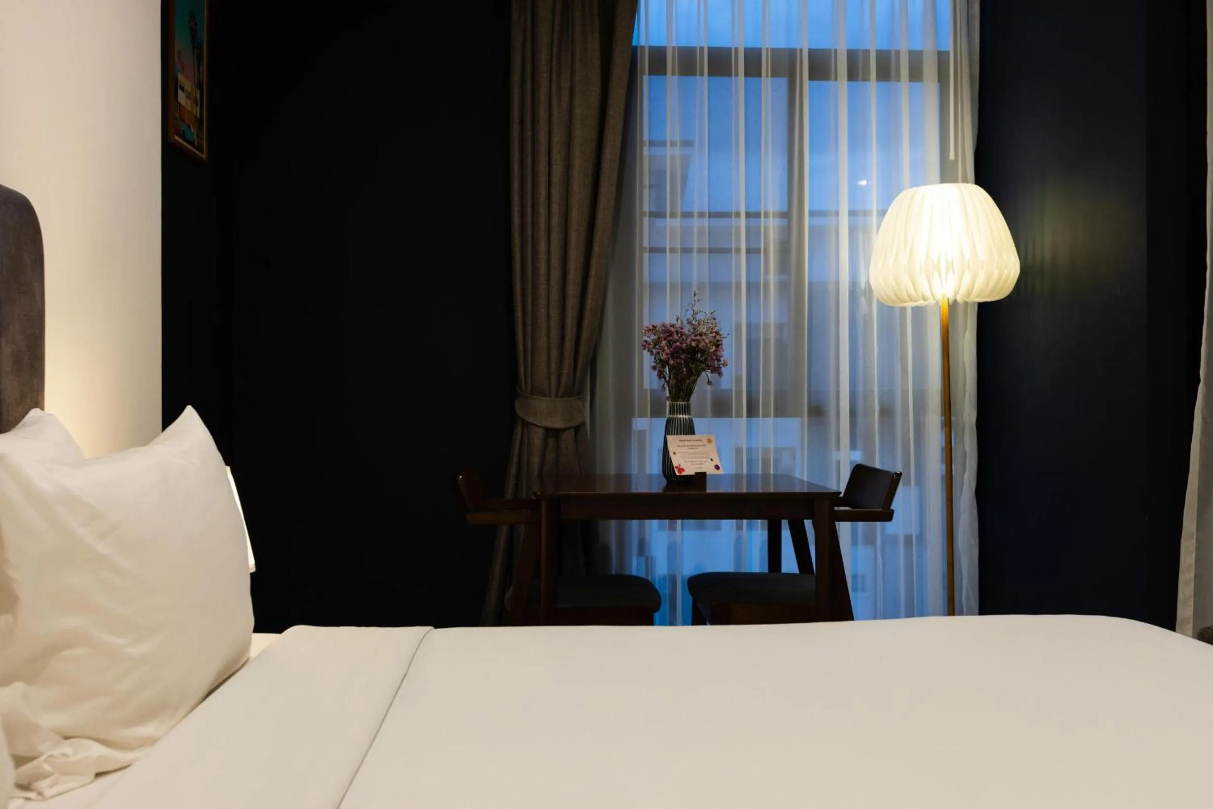 Bed in AMIRI PLACE HOTEL