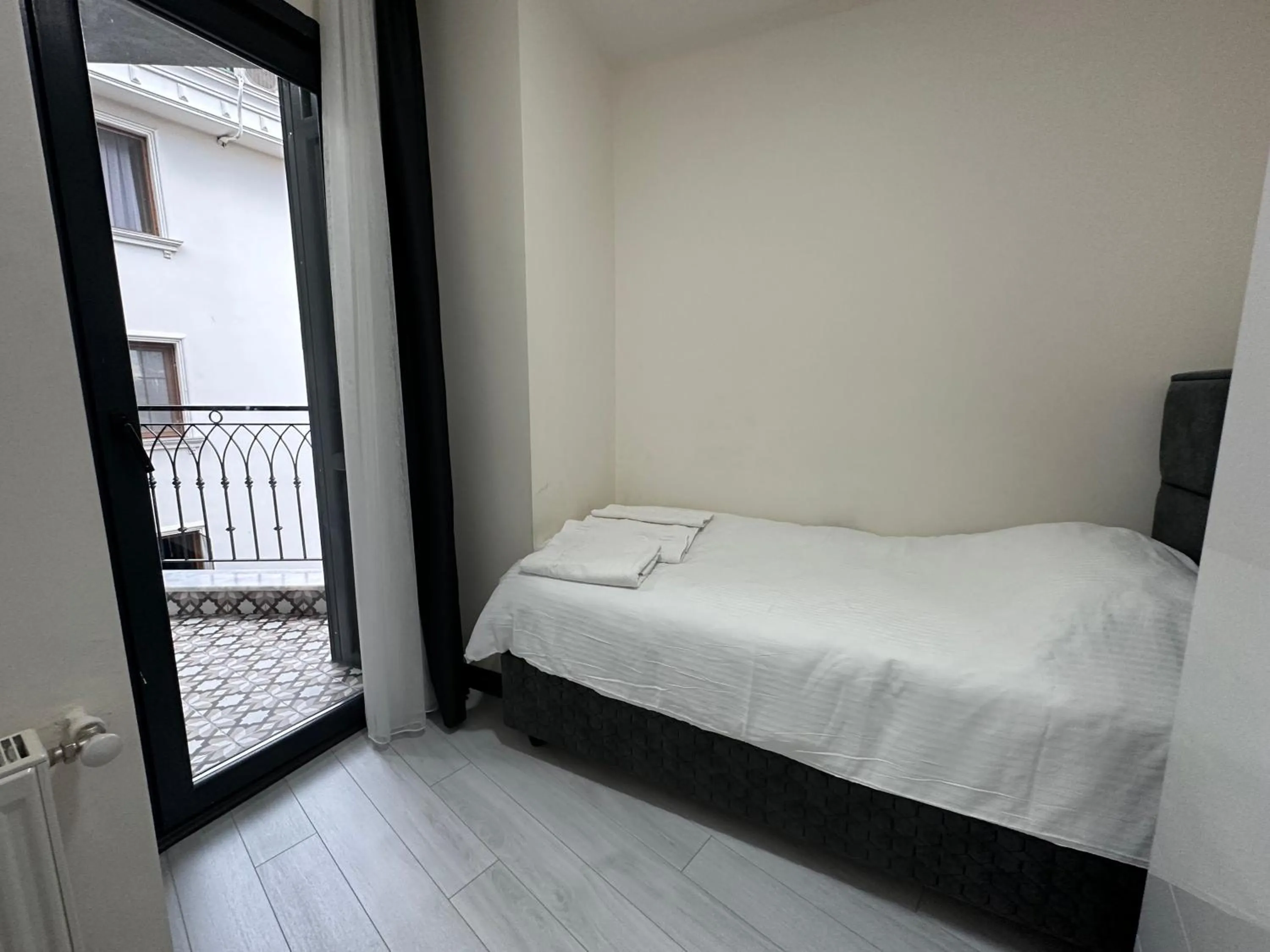 Bed in Rose Plus Residence