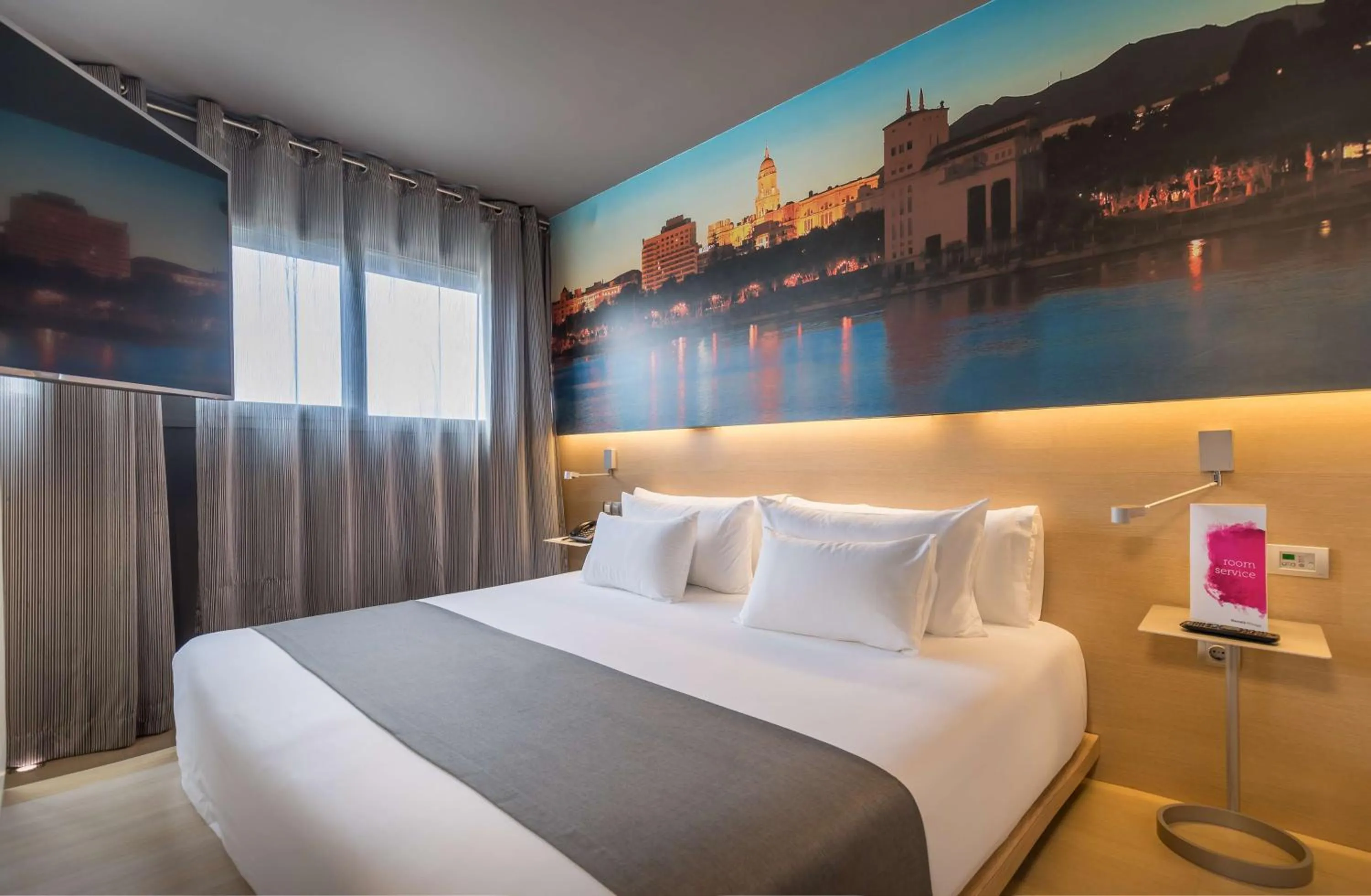 Photo of the whole room, Bed in Barceló Malaga