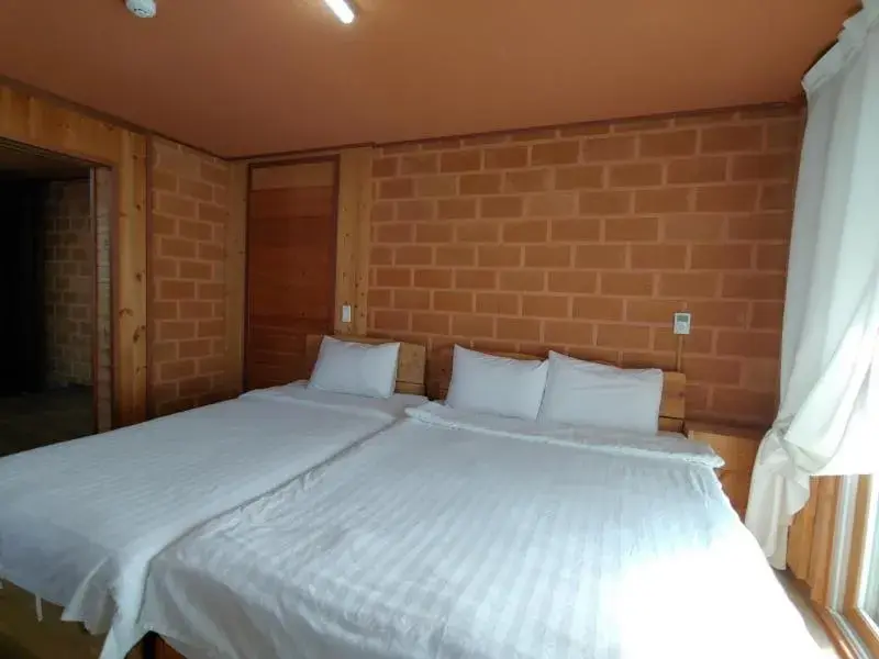 Bed in Jeju Hanibaram Pension Bed in Jeju Hanibaram Pension