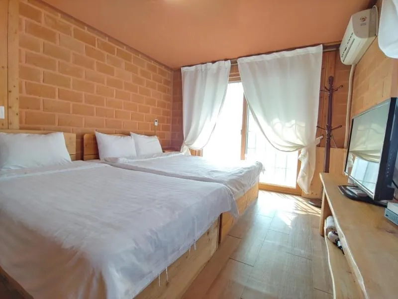 Bed in Jeju Hanibaram Pension