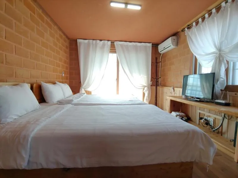 Bed in Jeju Hanibaram Pension