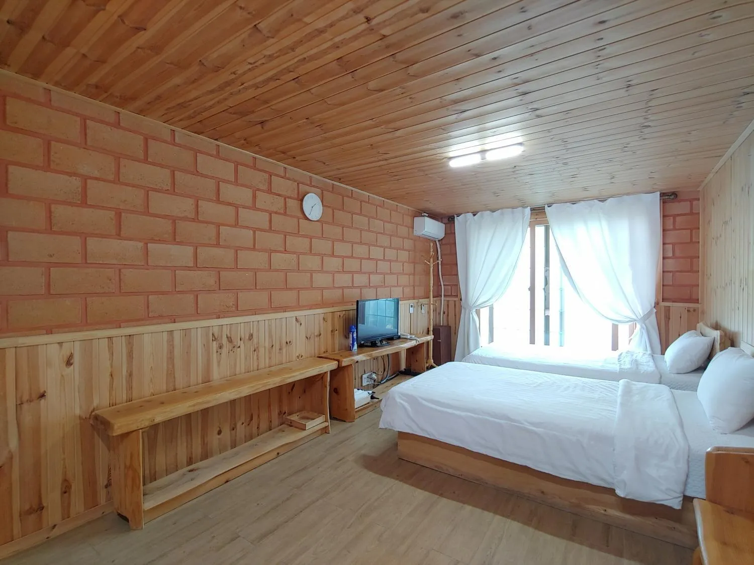 Bed in Jeju Hanibaram Pension