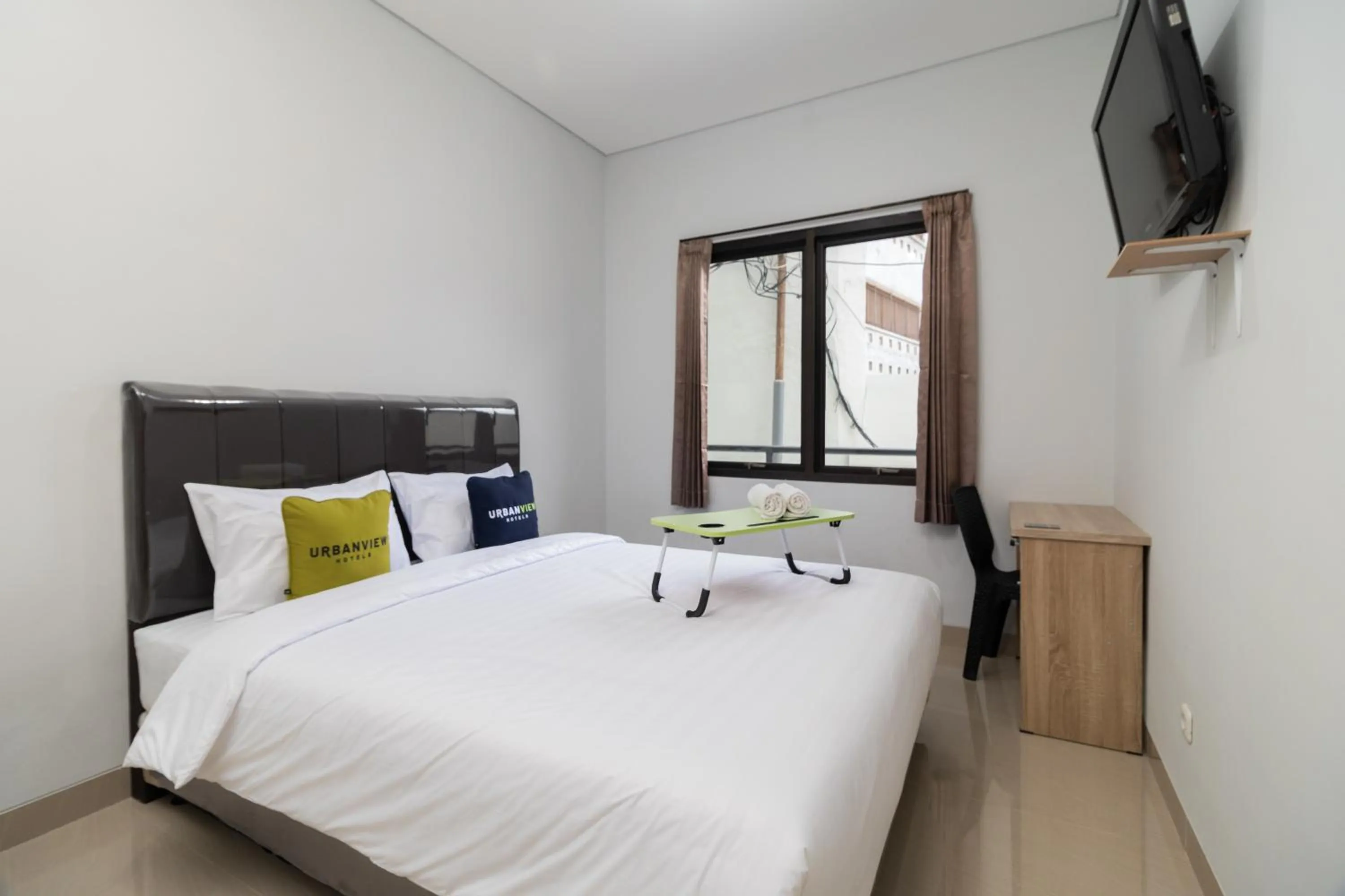 Bedroom, Bed in Urbanview Hotel Pasar Baru Jakarta by RedDoorz