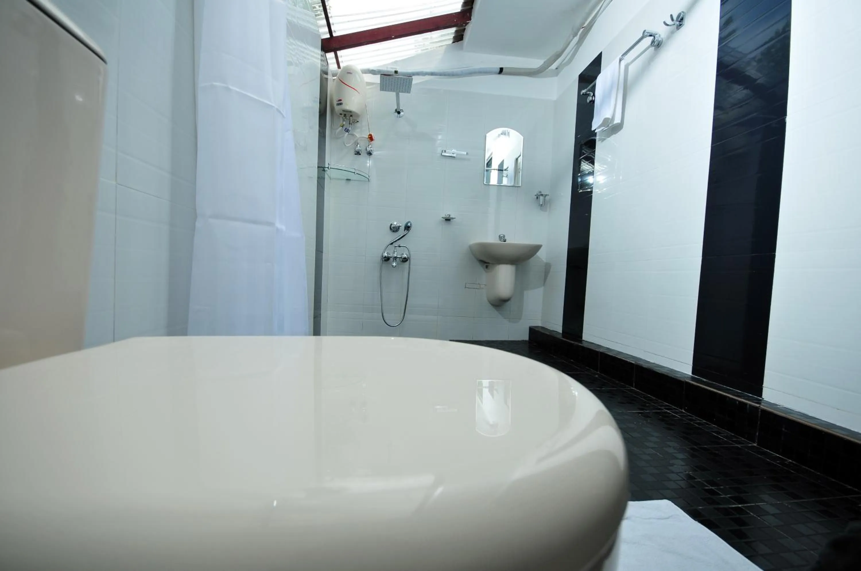 Shower in The Lake by Maat Hotels