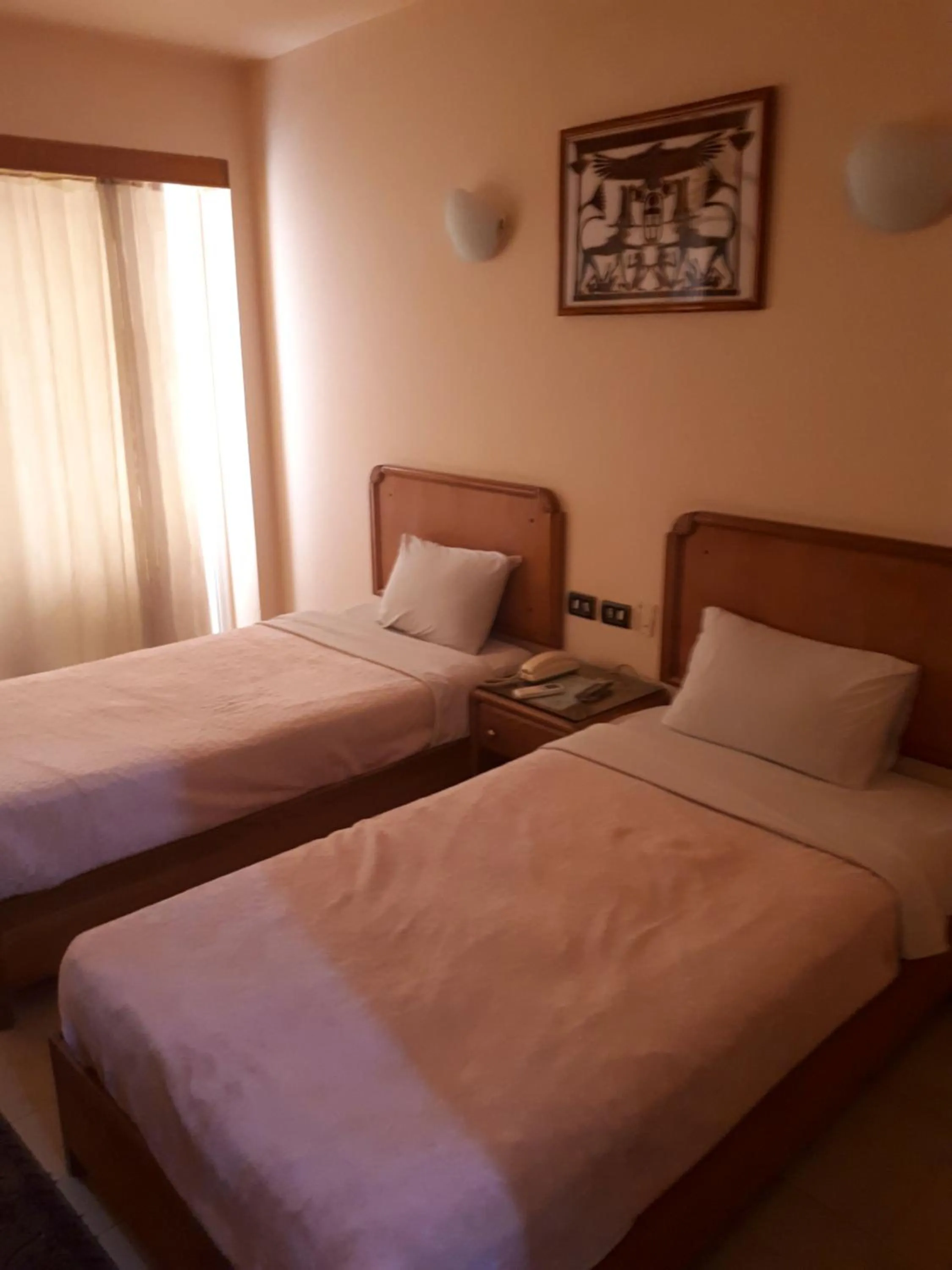 Bed in New Pola Hotel