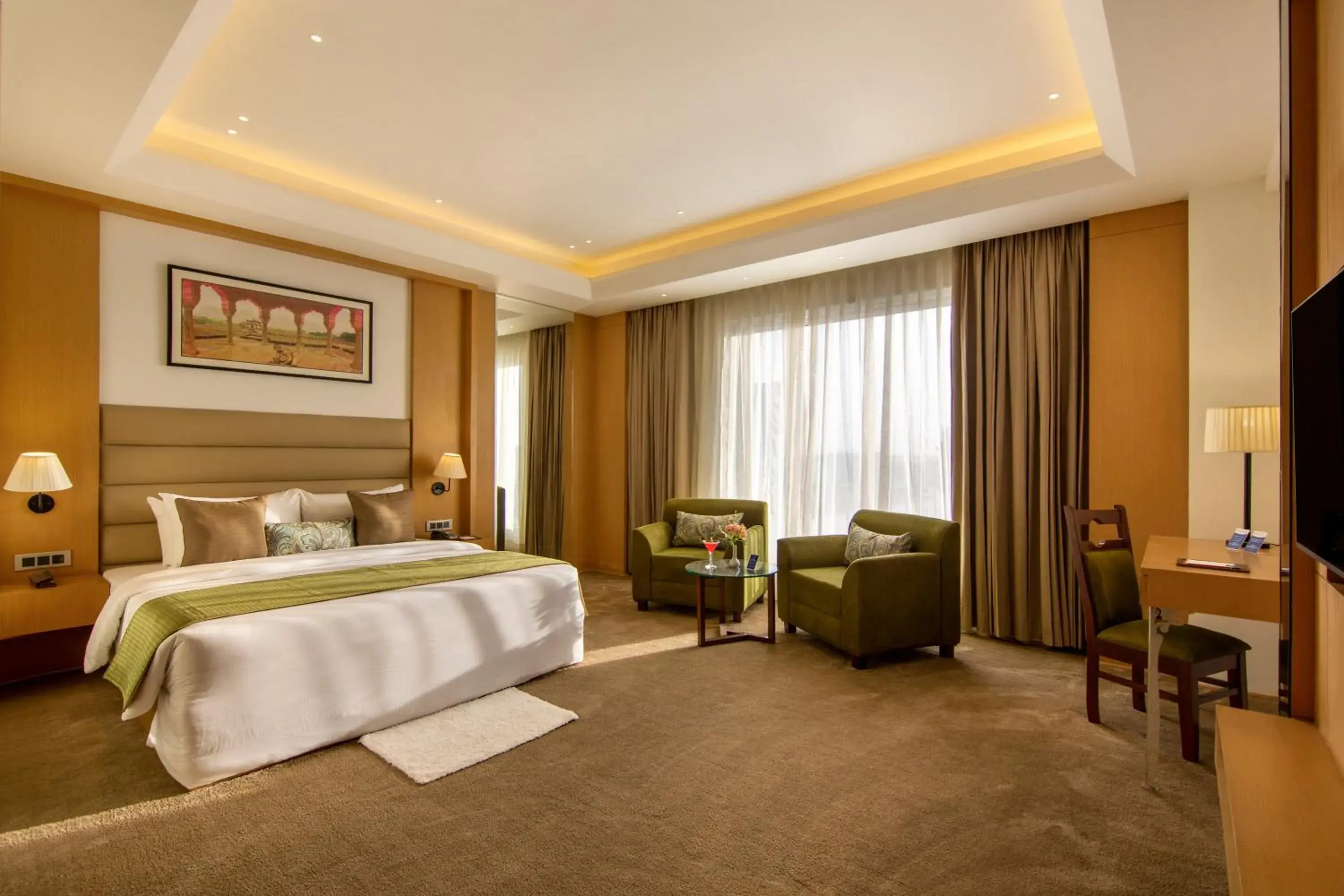Deluxe Suite - 1 King Bed in Sarovar Portico Sonipat Deluxe Suite - 1 King Bed in Sarovar Portico Sonipat