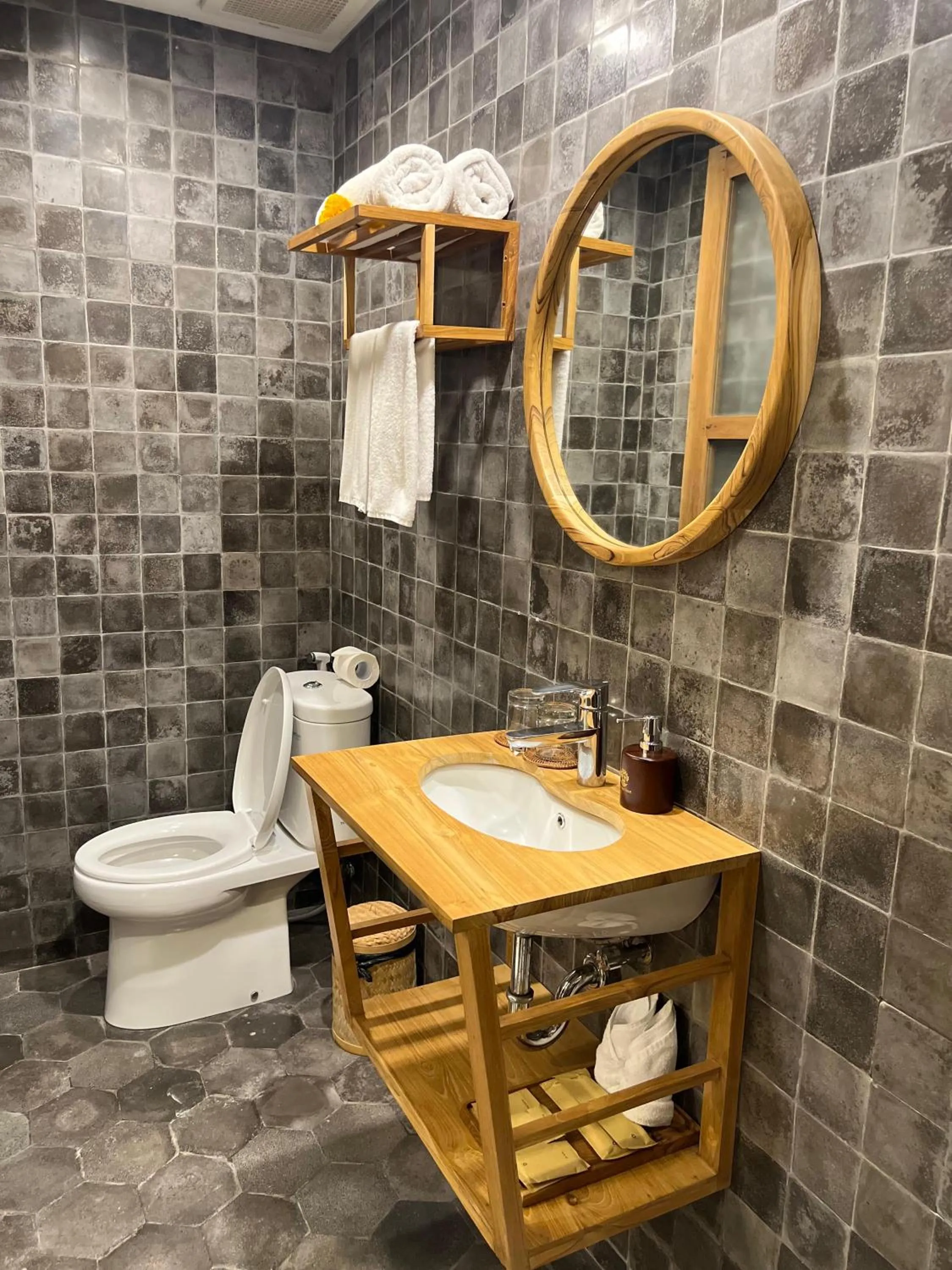 Toilet in RUMAH KAYU RESORT