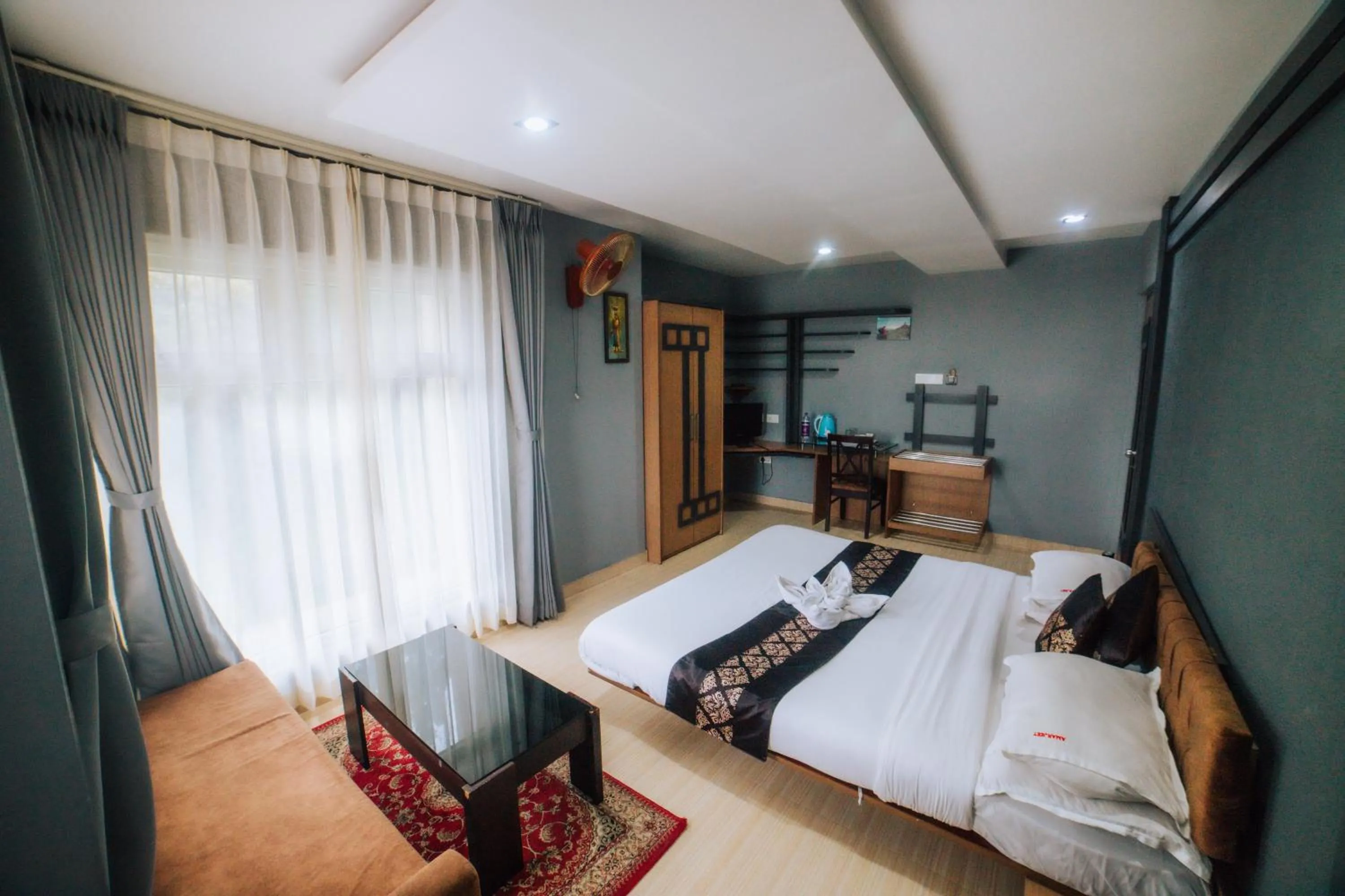 Bed in Amarjeet Hotel