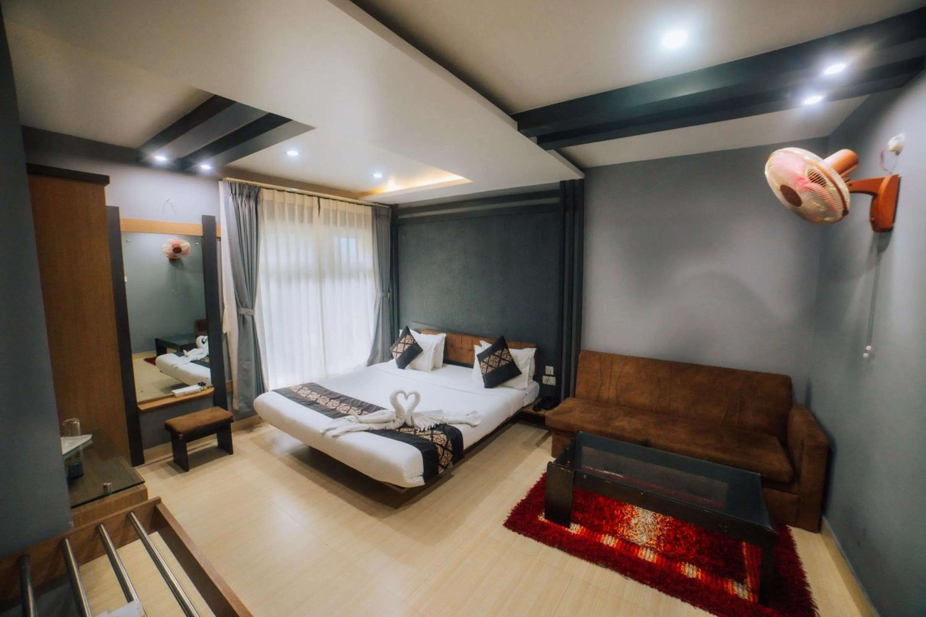 Bed in Amarjeet Hotel