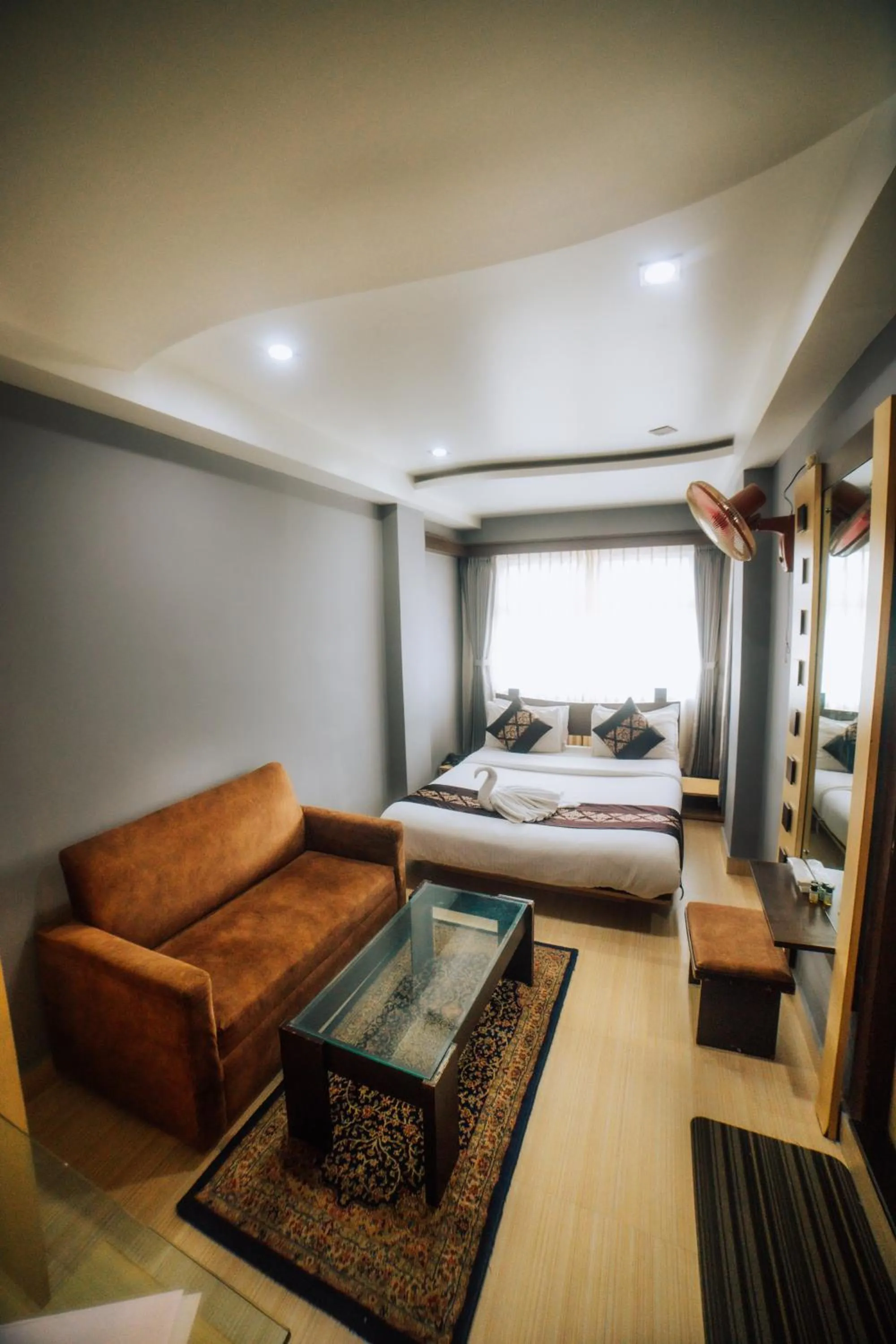 Bed in Amarjeet Hotel