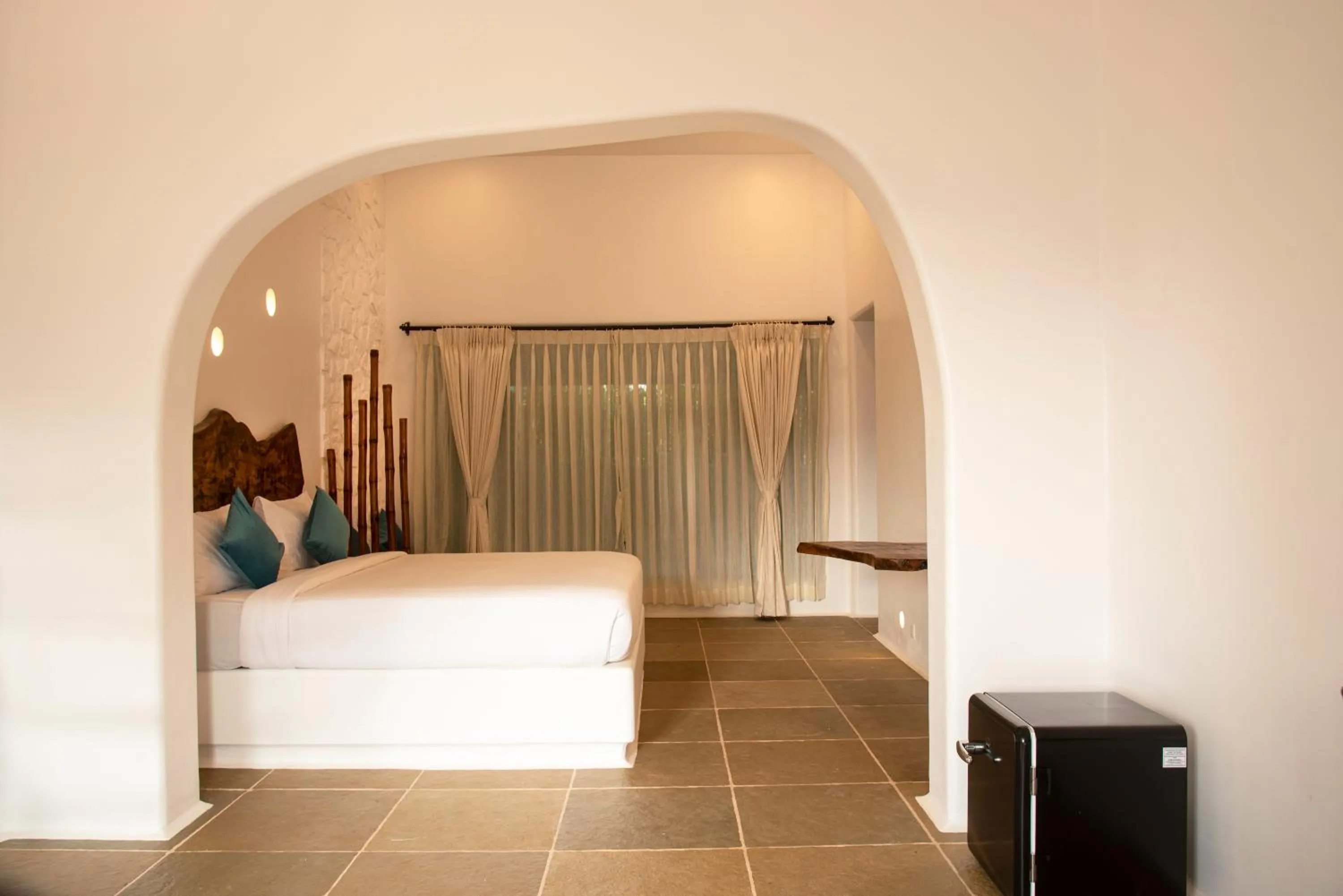 Bed in Conch Resort Luxury Private Pool Suites