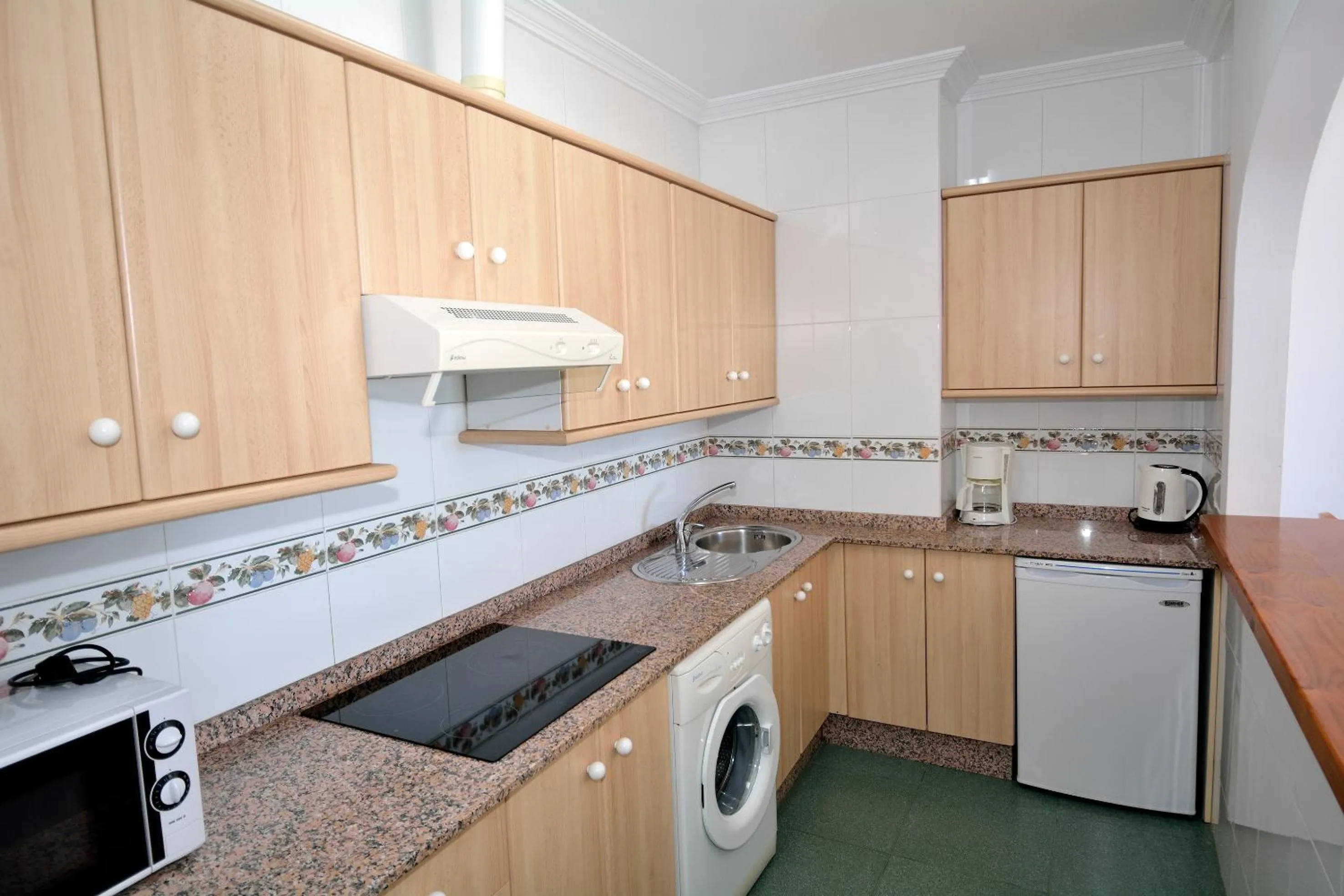 Kitchen or kitchenette in Apartamentos HC Burriana Playa