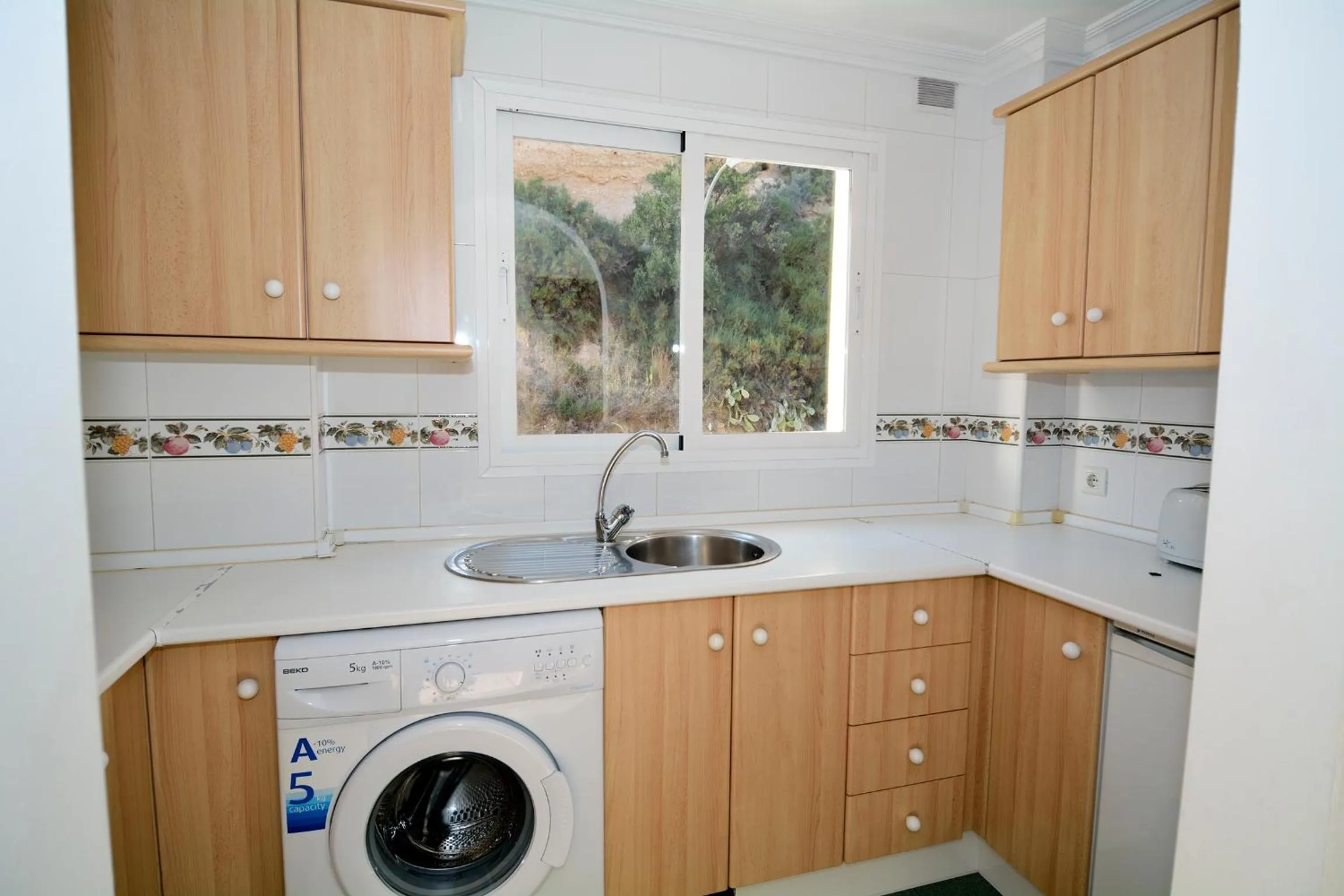 Kitchen or kitchenette in Apartamentos HC Burriana Playa