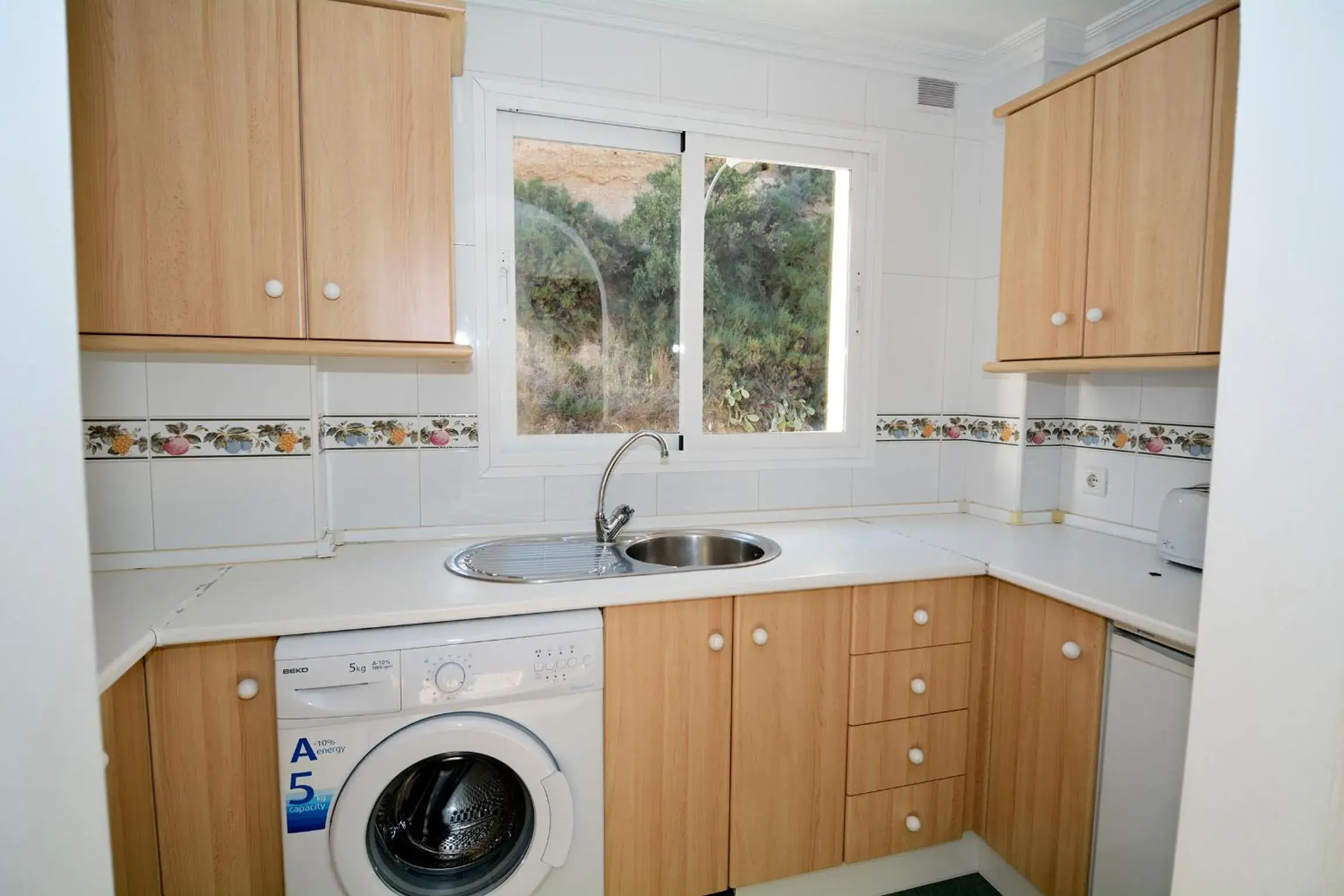 Kitchen or kitchenette in Apartamentos HC Burriana Playa Kitchen or kitchenette in Apartamentos HC Burriana Playa