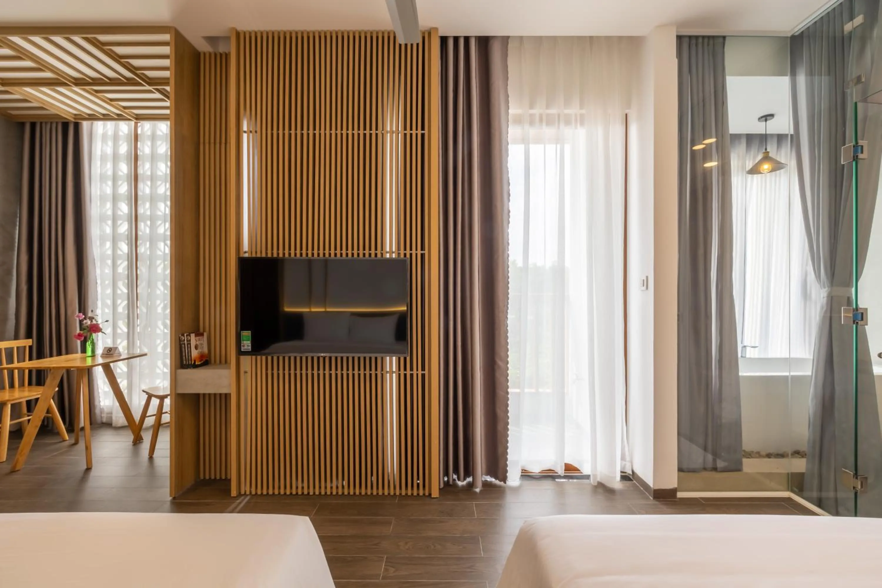 Communal lounge/ TV room, Bed in Moon Sun Boutique Villa Hotel