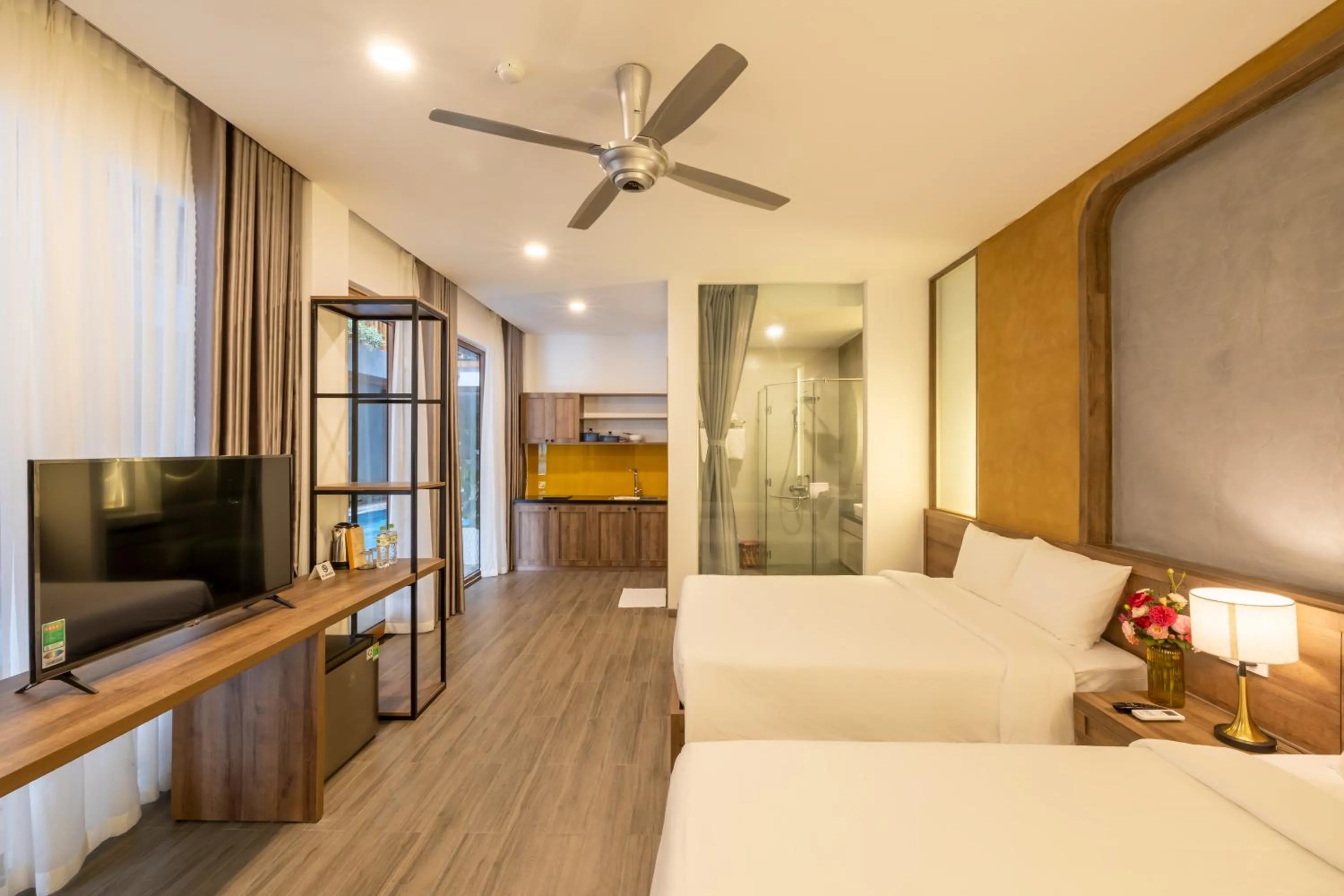 Communal lounge/ TV room, Bed in Moon Sun Boutique Villa Hotel