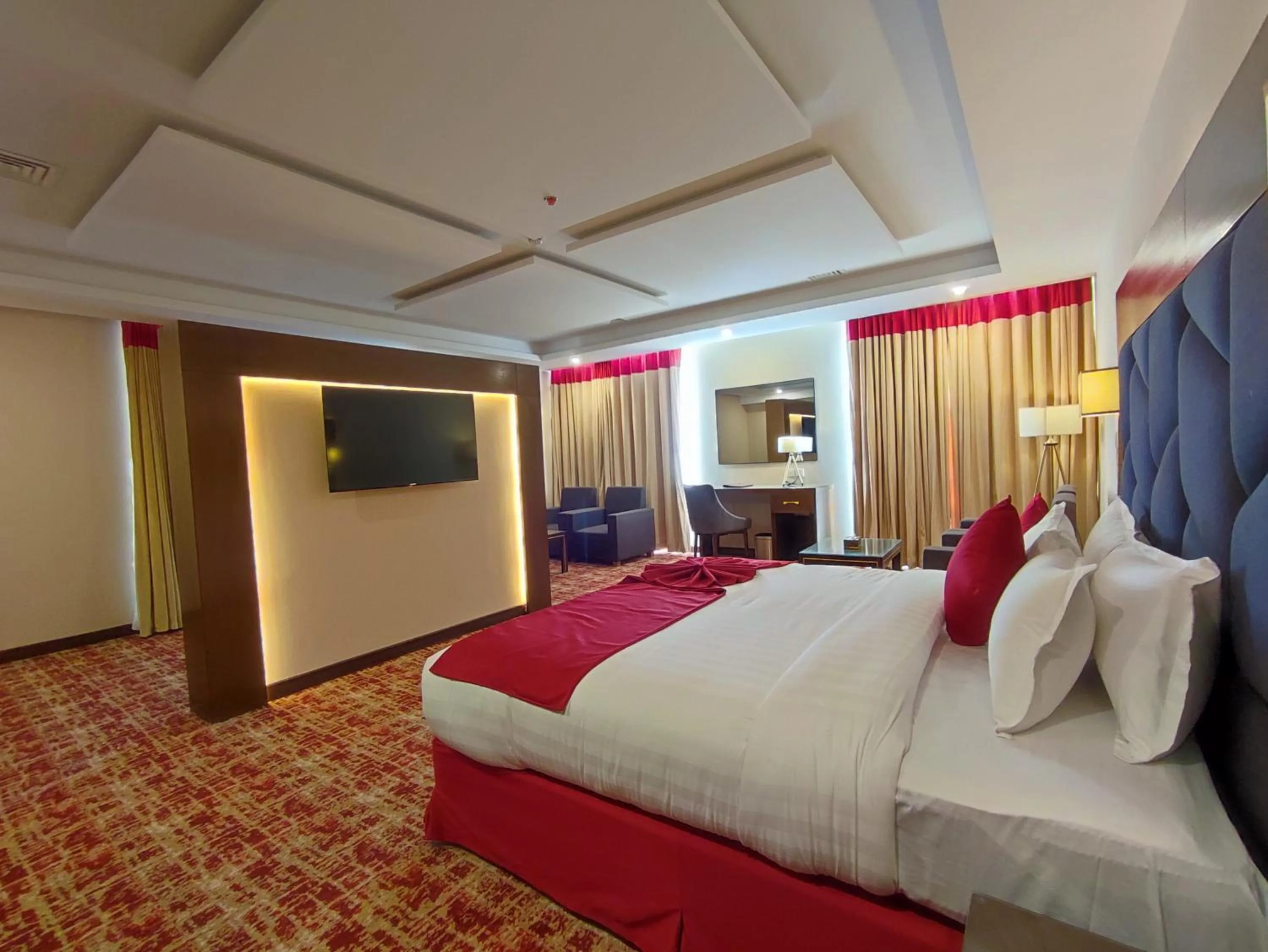 Communal lounge/ TV room, Bed in Ramada by Wyndham Murree Lower Topa Resort