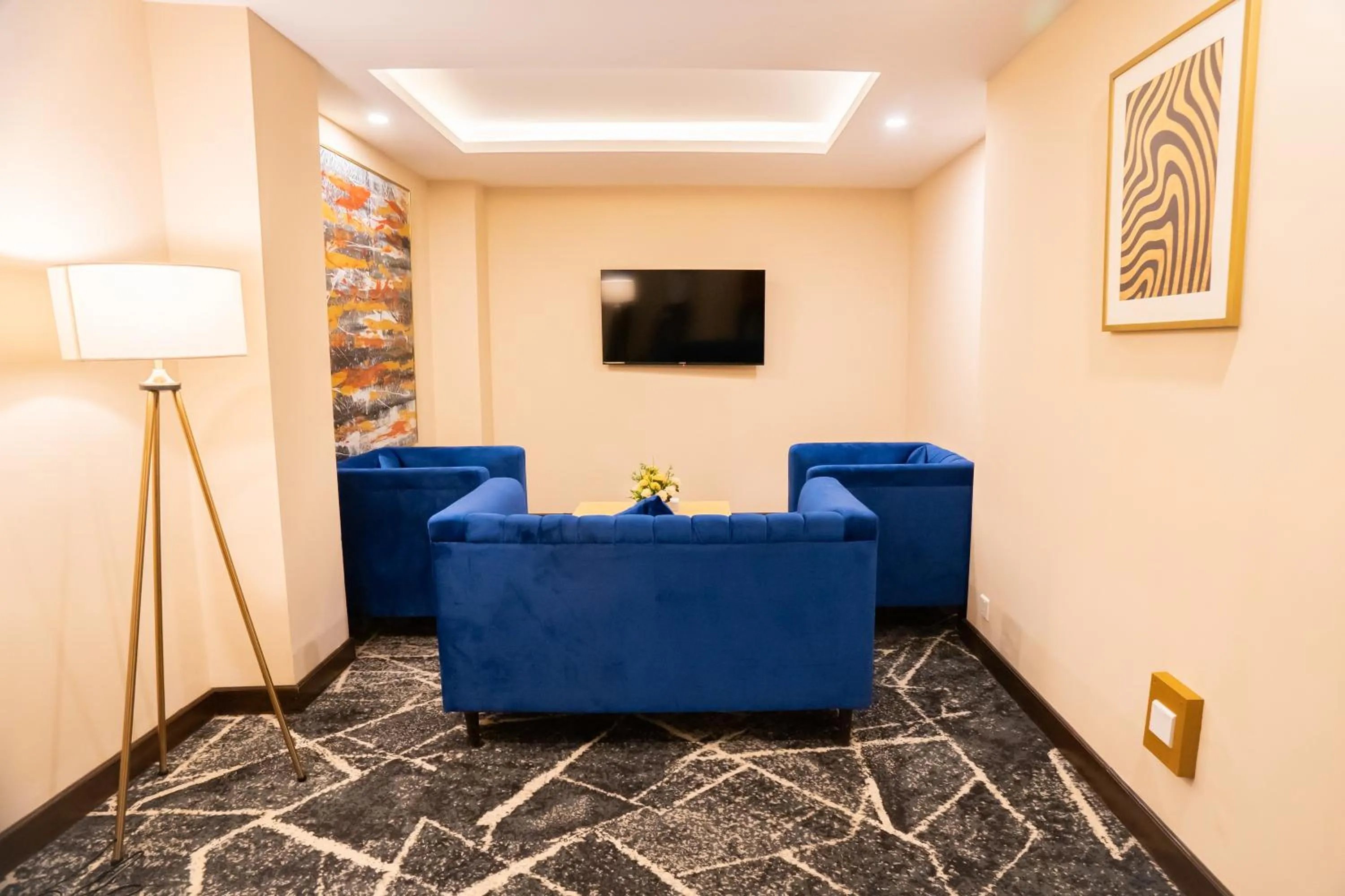 Communal lounge/ TV room in Ramada by Wyndham Murree Lower Topa Resort