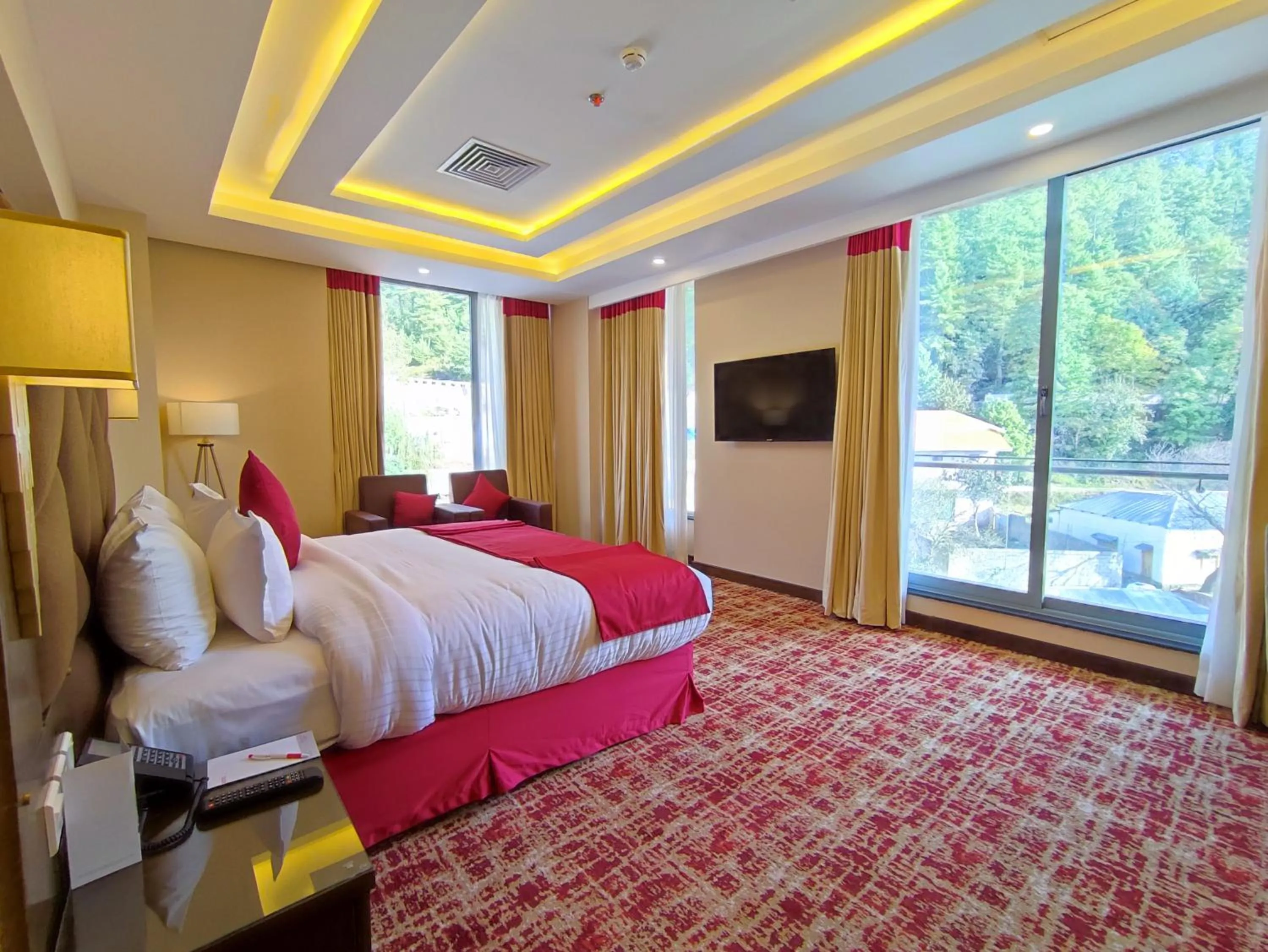 Living room, Bed in Ramada by Wyndham Murree Lower Topa Resort