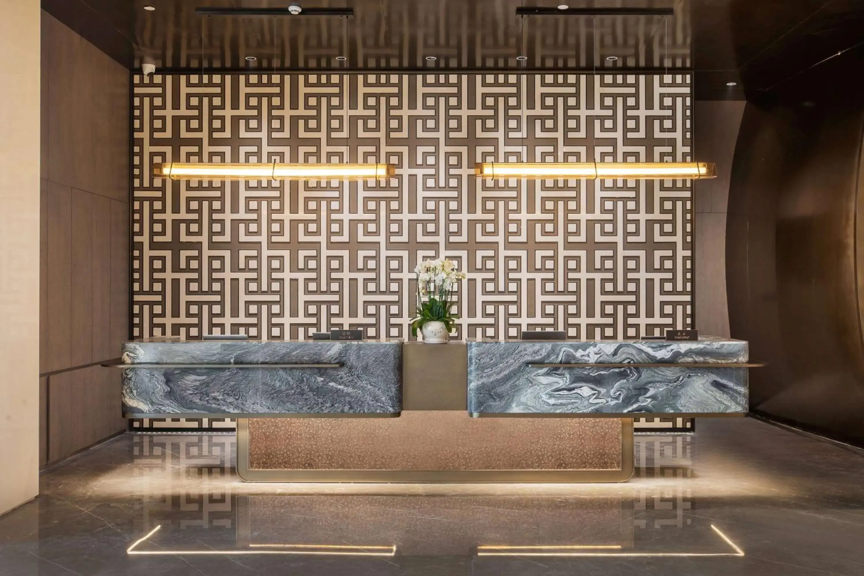 Lobby or reception in Ramada By Wyndham Xiangyang Xiangcheng Lobby or reception in Ramada By Wyndham Xiangyang Xiangcheng