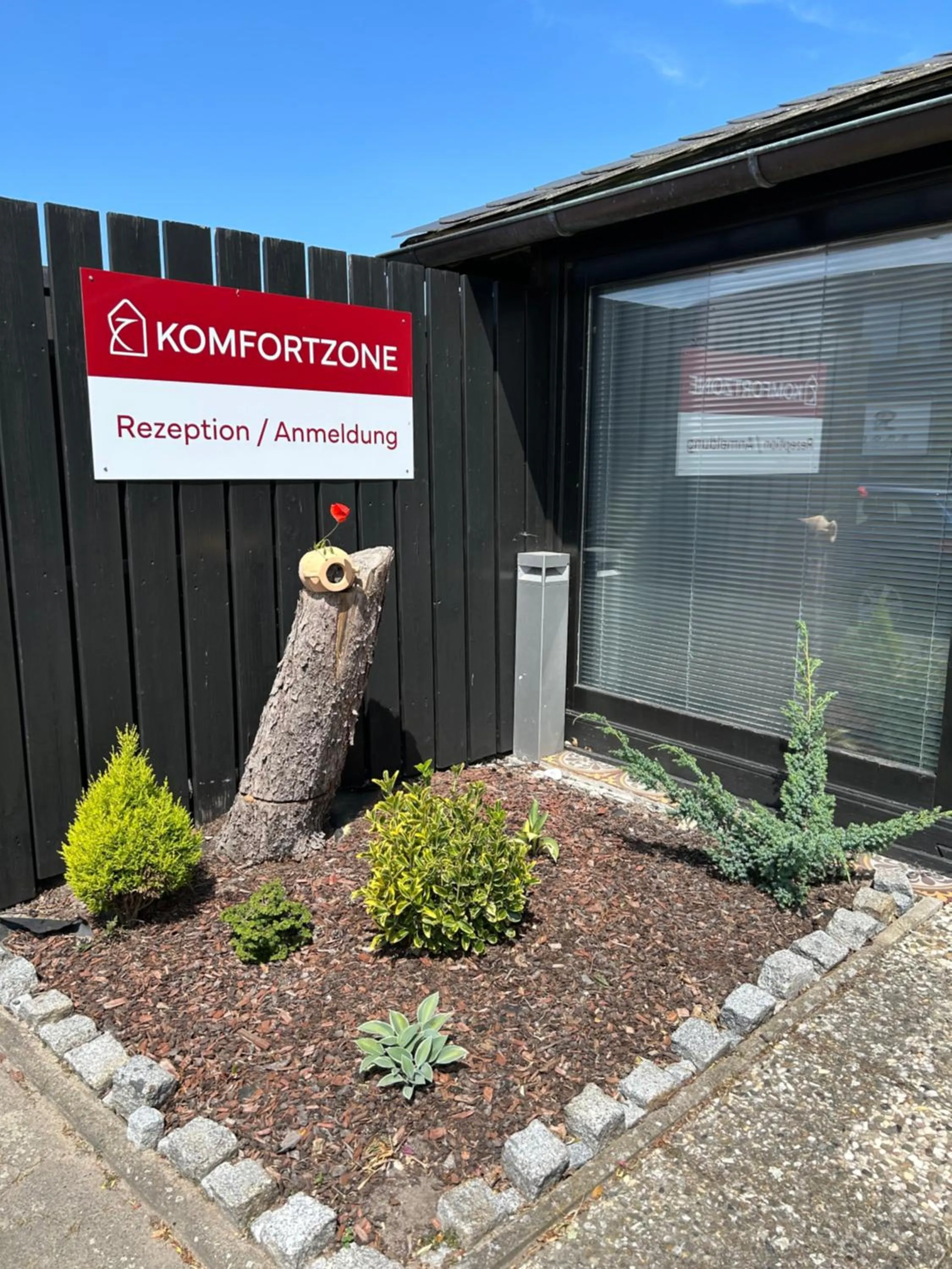 Property logo or sign in Komfort Zone