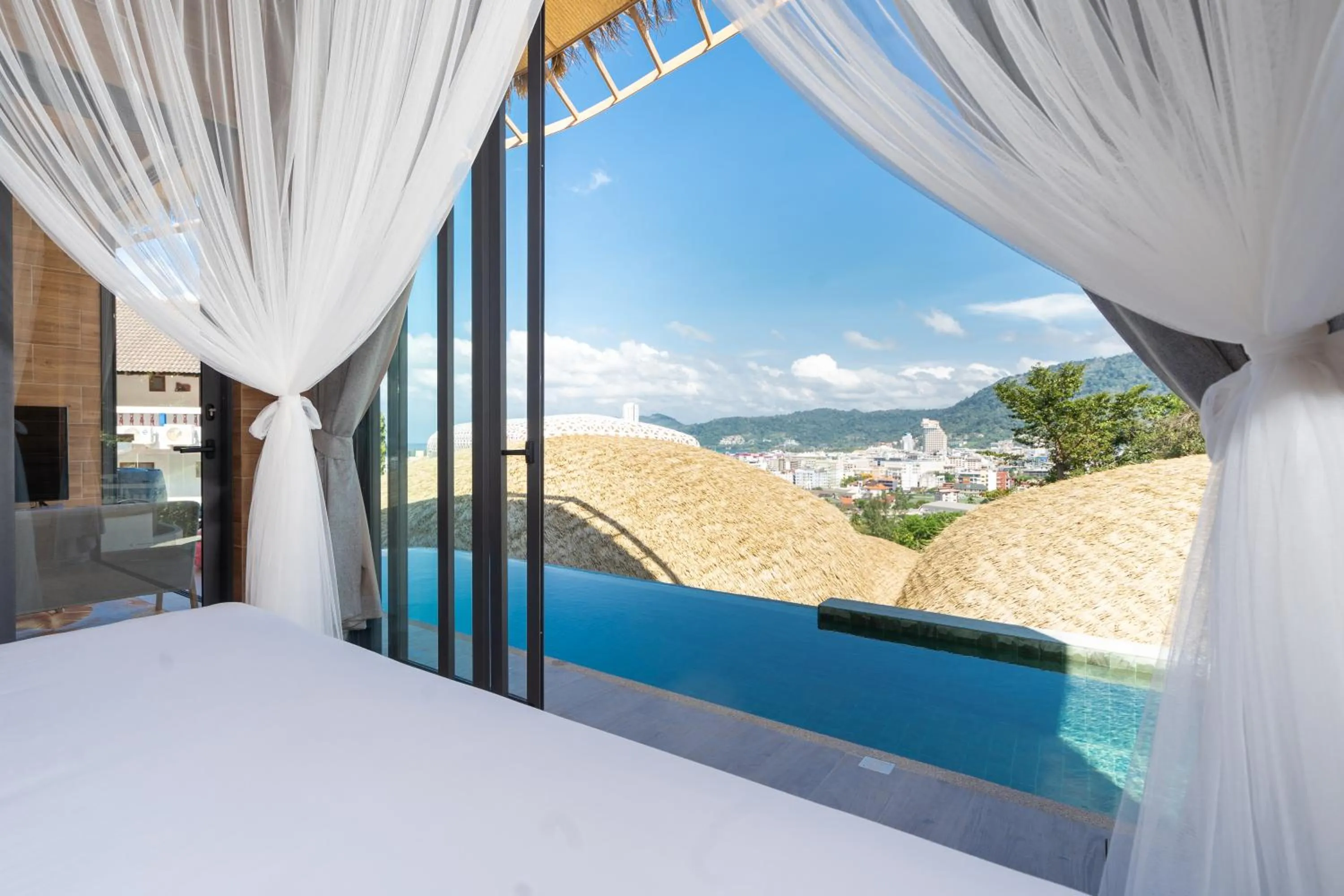Pool view, Bed in Three Monkeys Villas